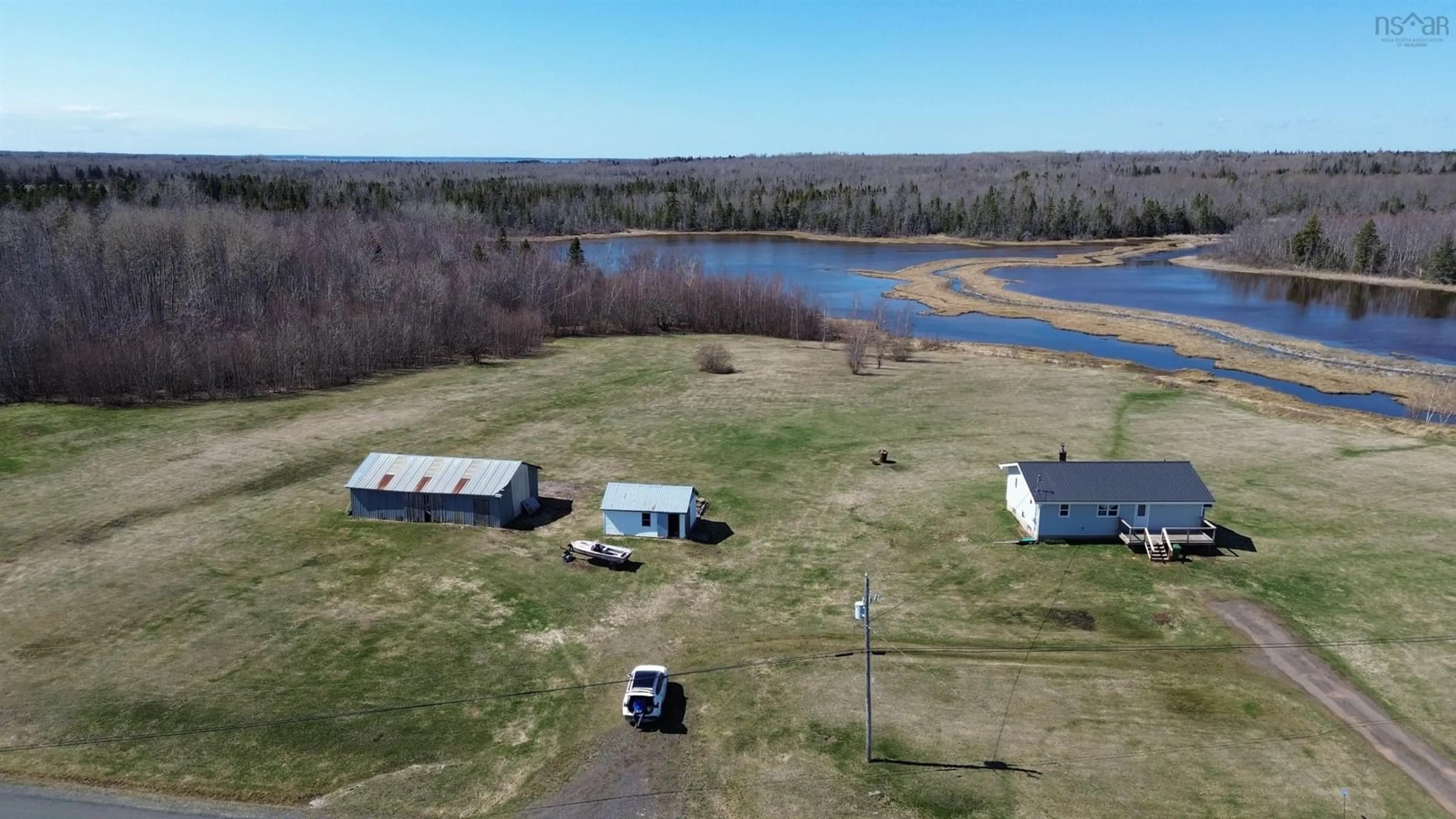 A pic from outside/outdoor area/front of a property/back of a property/a pic from drone, water/lake/river/ocean view for 3999 Malagash Rd, Malagash Point Nova Scotia B0K 1E0