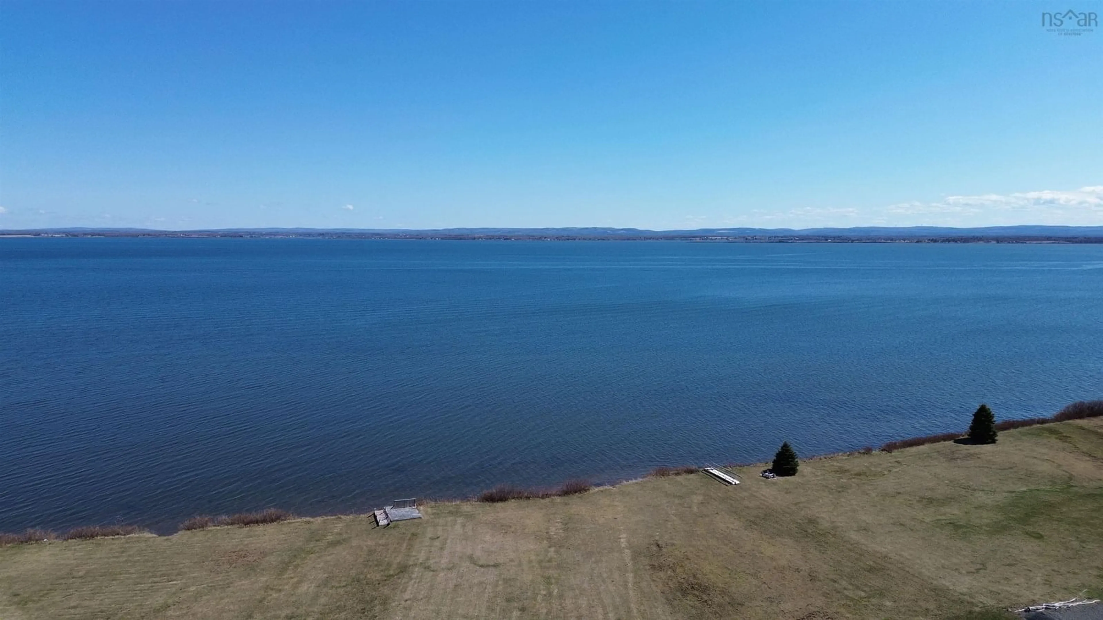 A pic from outside/outdoor area/front of a property/back of a property/a pic from drone, water/lake/river/ocean view for 3999 Malagash Rd, Malagash Point Nova Scotia B0K 1E0