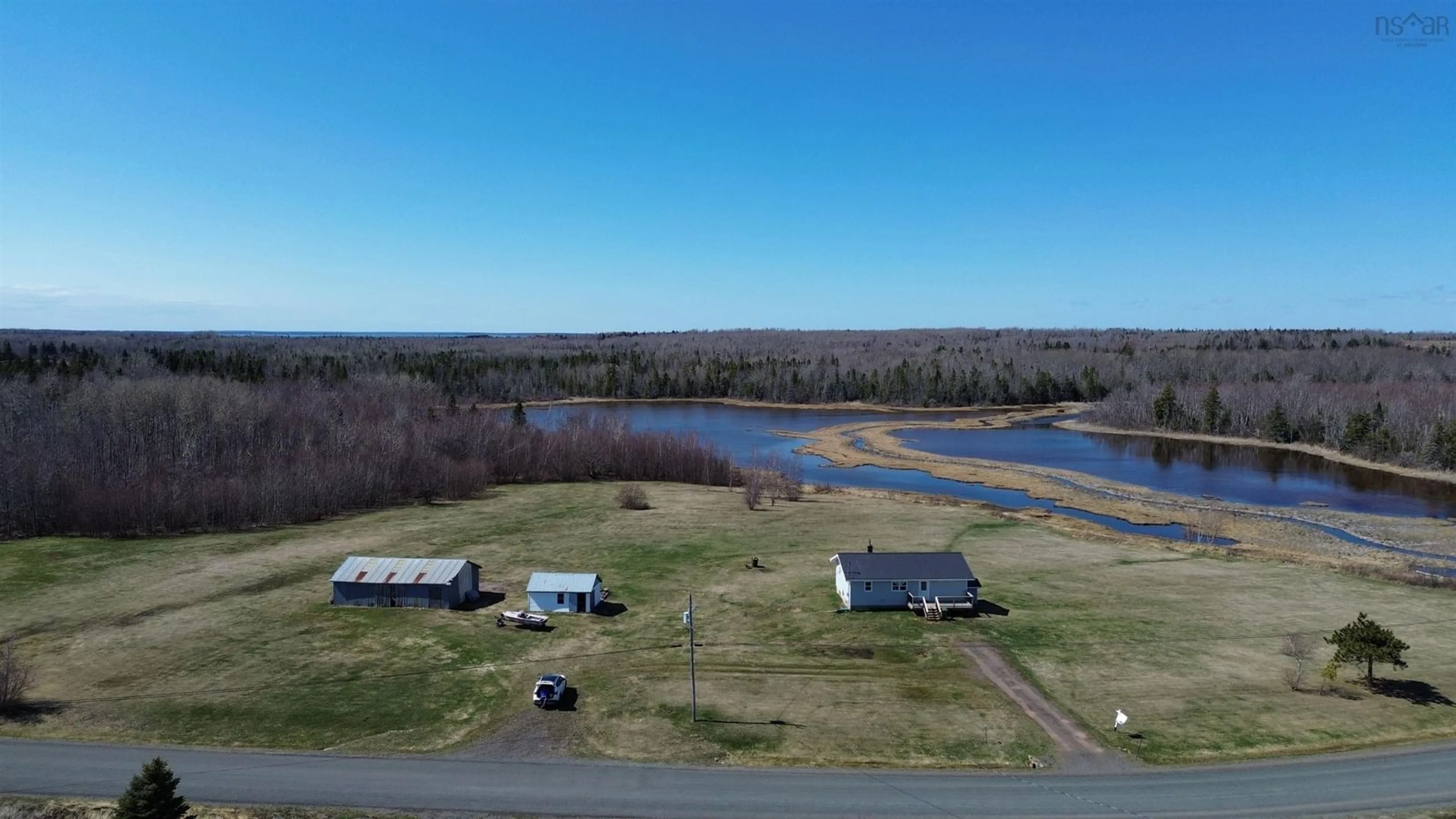 A pic from outside/outdoor area/front of a property/back of a property/a pic from drone, water/lake/river/ocean view for 3999 Malagash Rd, Malagash Point Nova Scotia B0K 1E0