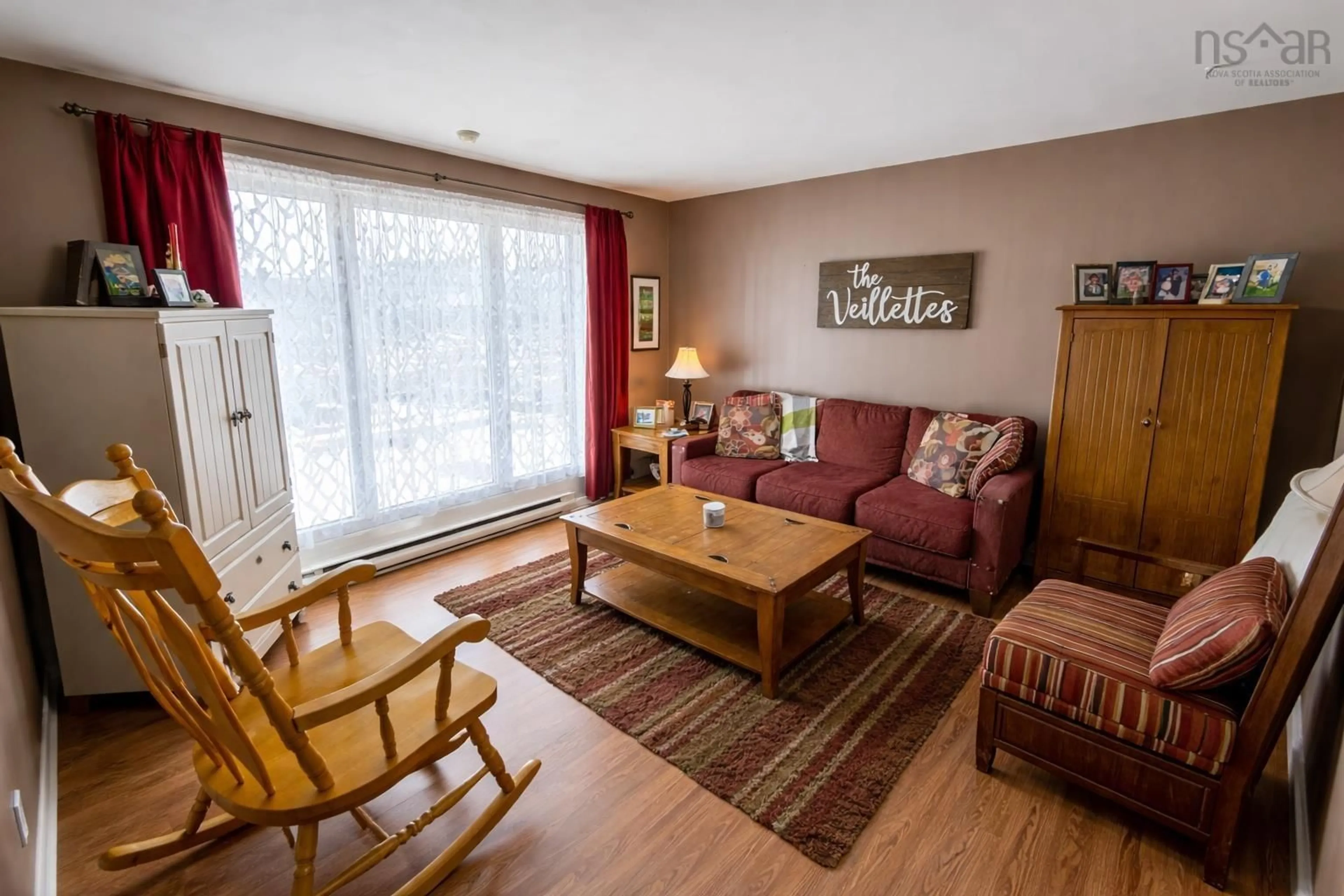 Living room with furniture, wood/laminate floor for 76 Rosewood Lane, Eastern Passage Nova Scotia B3G 1B3