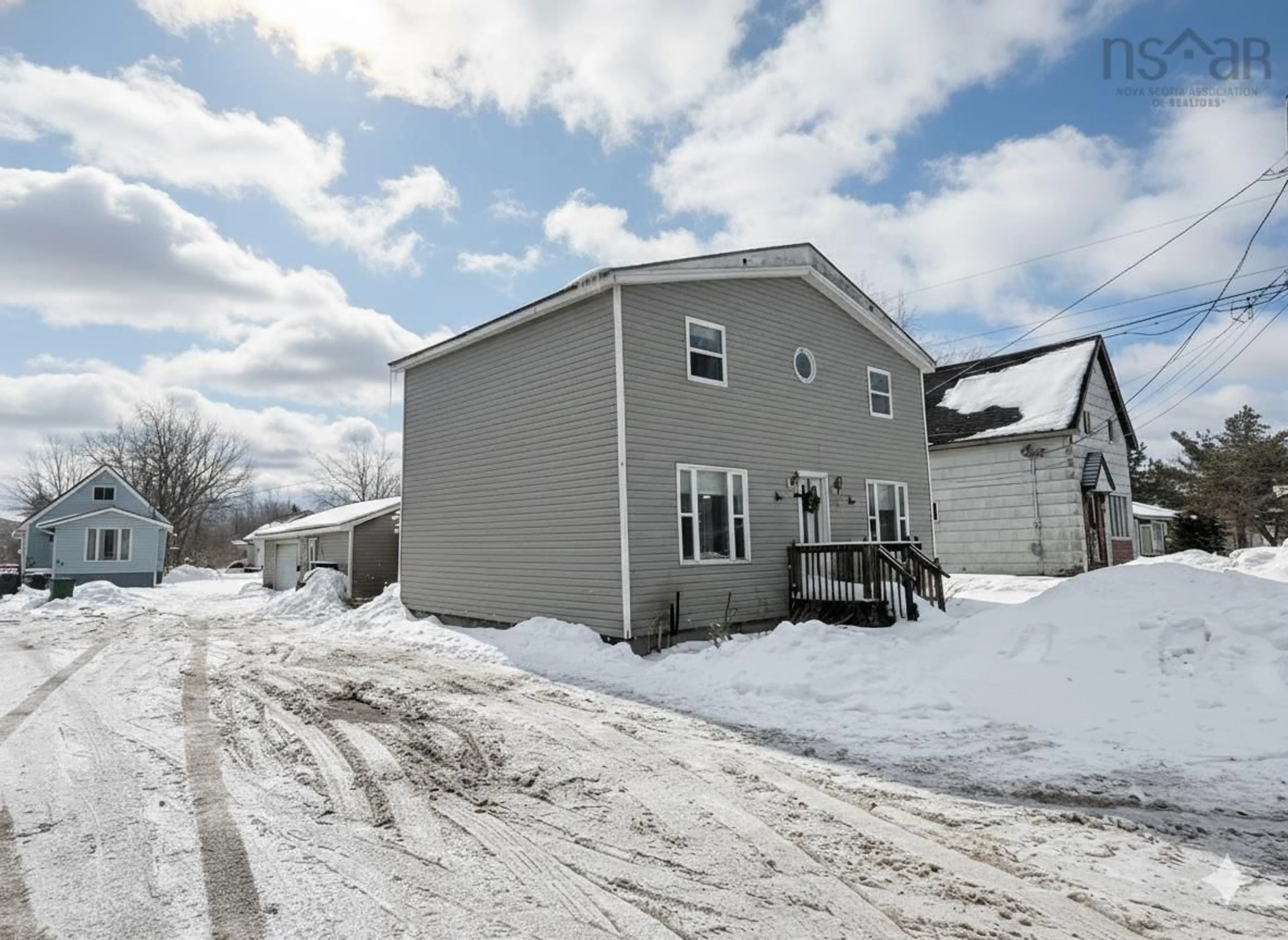 A pic from outside/outdoor area/front of a property/back of a property/a pic from drone, street for 68 Mcgee St St, Amherst Nova Scotia B0M 1X0