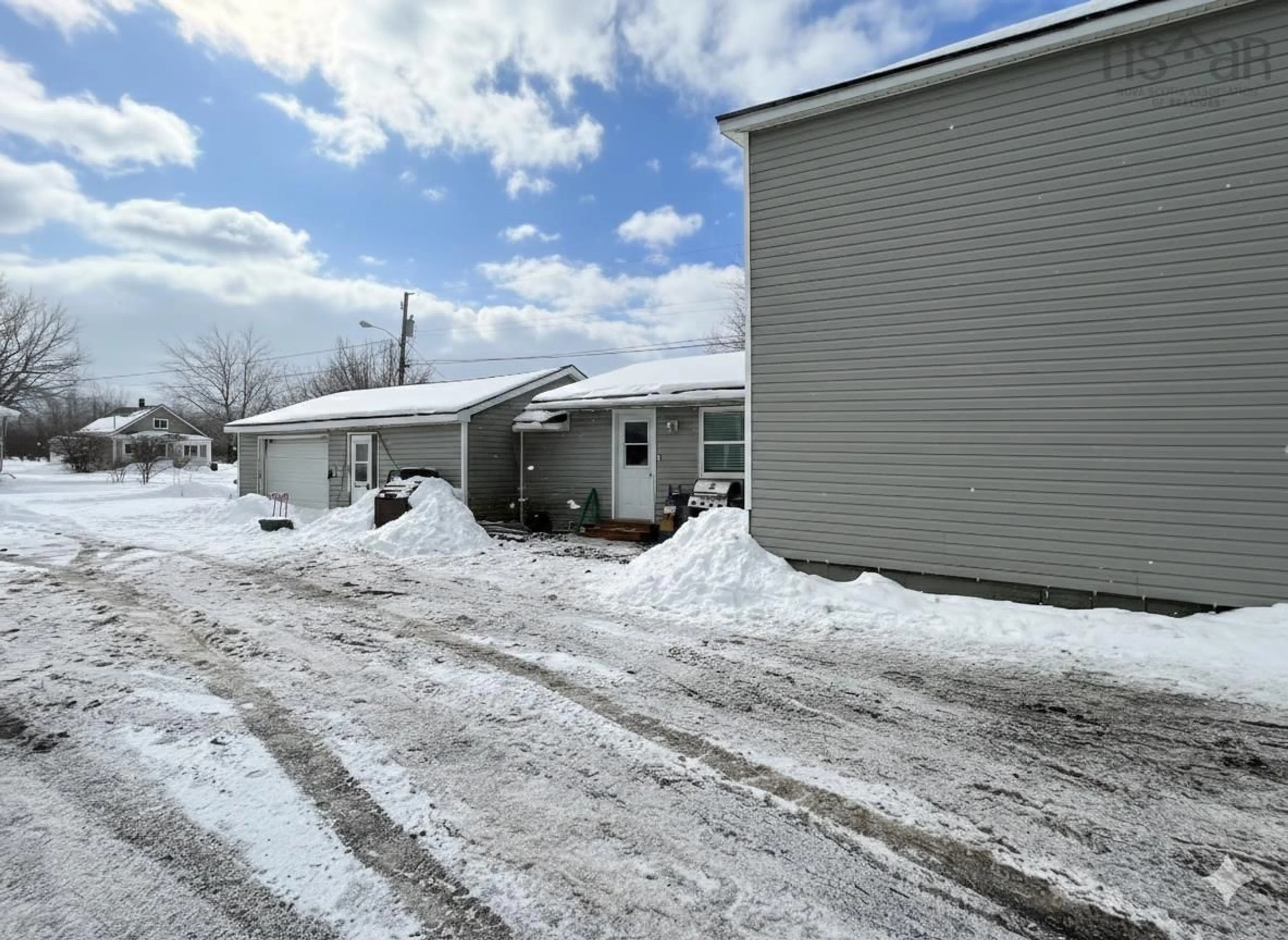A pic from outside/outdoor area/front of a property/back of a property/a pic from drone, street for 68 Mcgee St St, Amherst Nova Scotia B0M 1X0