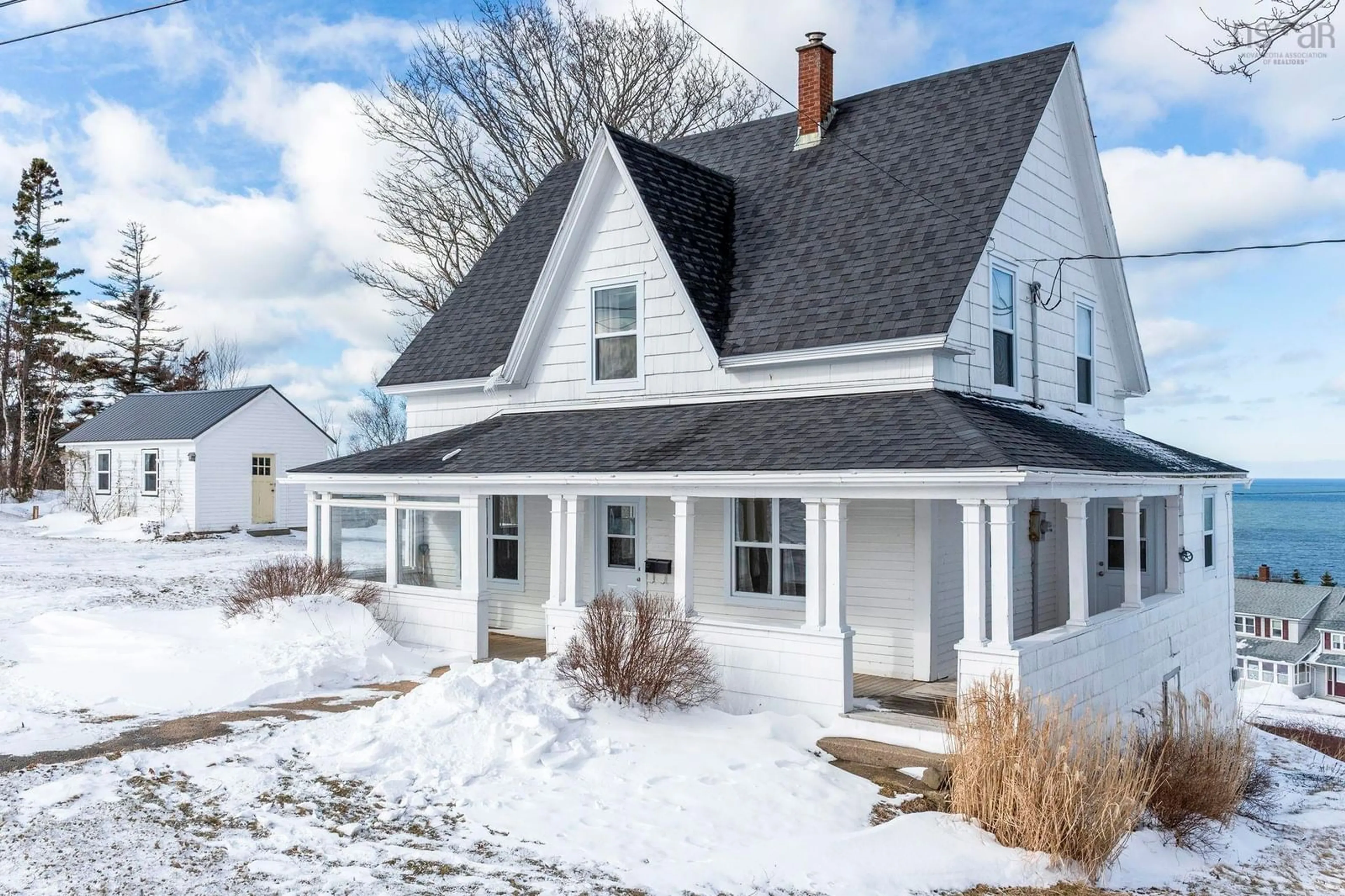 Home with vinyl exterior material, street for 3693 Shore Rd, Hillsburn Nova Scotia B0S 1A0