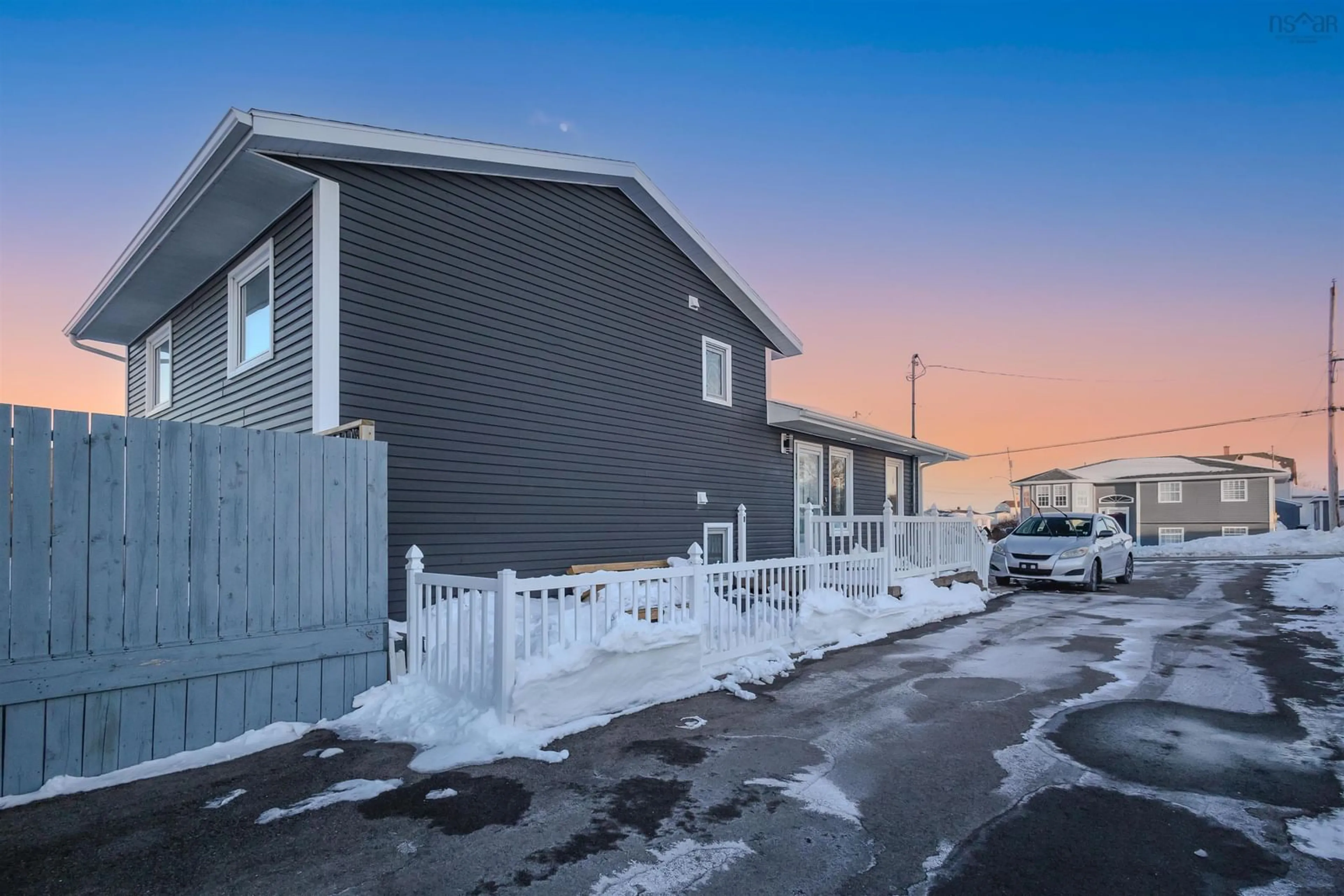 A pic from outside/outdoor area/front of a property/back of a property/a pic from drone, street for 100 Ocean Ave, Glace Bay Nova Scotia B1A 3V4