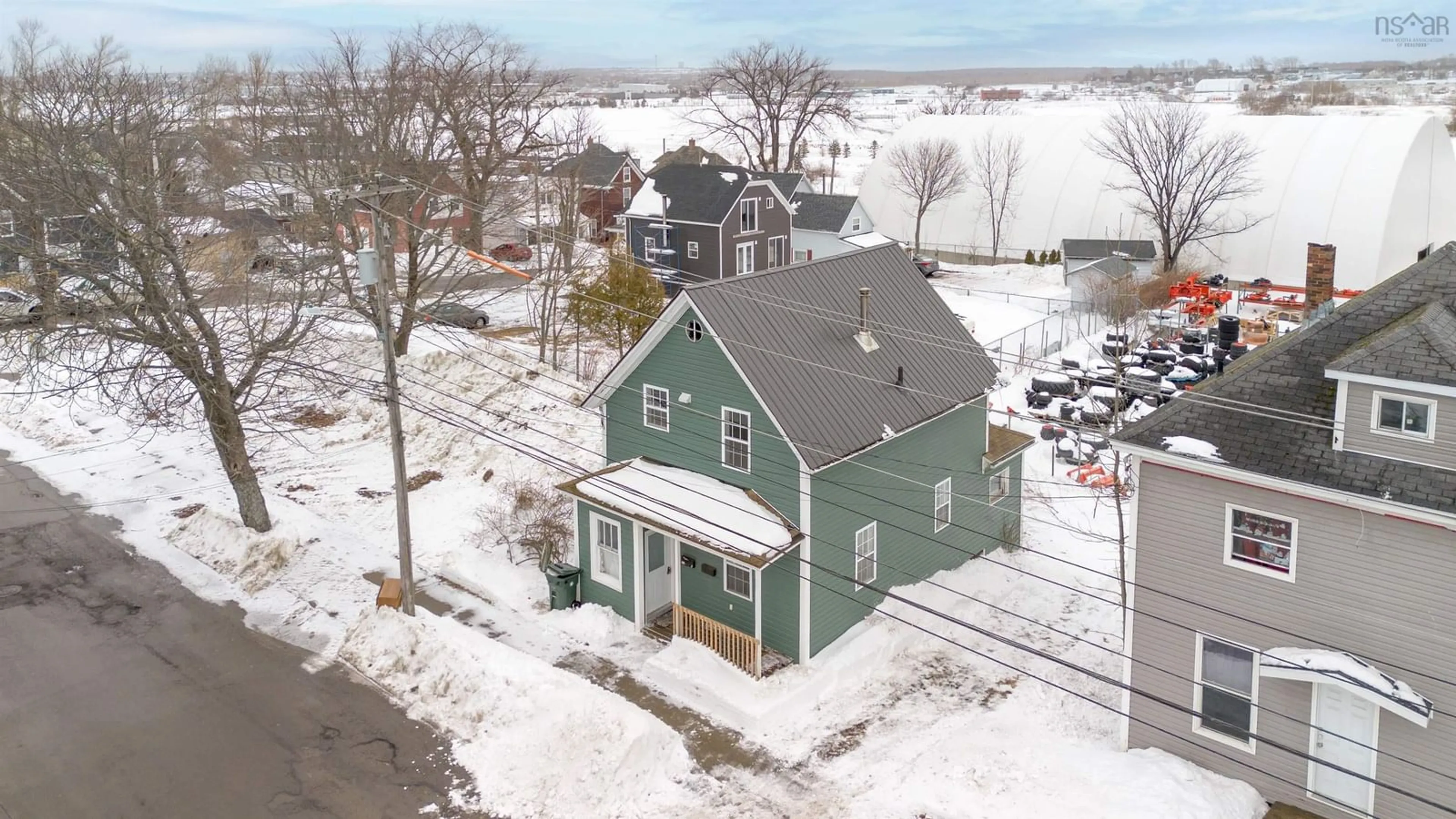 A pic from outside/outdoor area/front of a property/back of a property/a pic from drone, street for 59 Johnston St, Sydney Nova Scotia B1P 1T2
