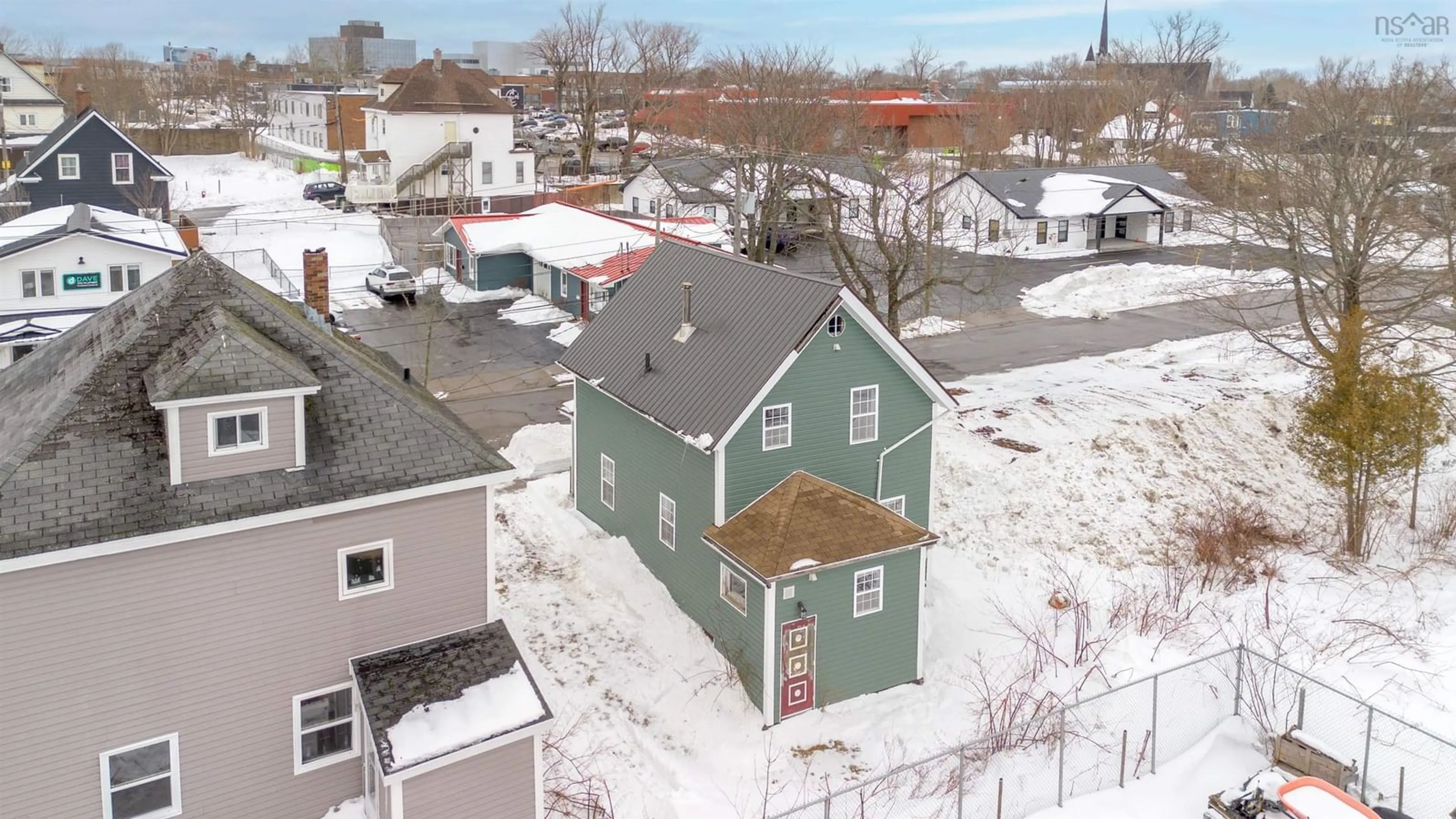 A pic from outside/outdoor area/front of a property/back of a property/a pic from drone, street for 59 Johnston St, Sydney Nova Scotia B1P 1T2