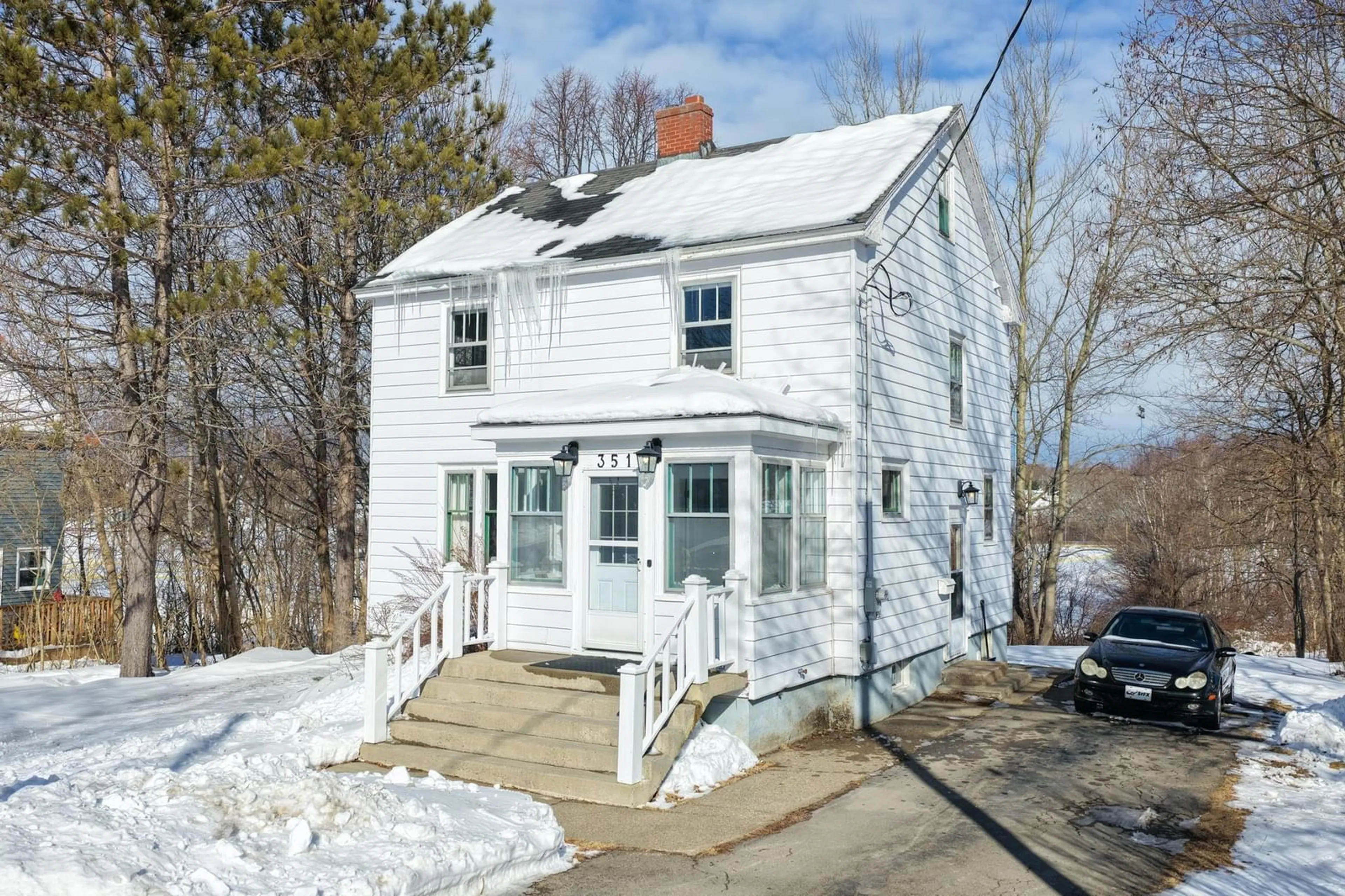 A pic from outside/outdoor area/front of a property/back of a property/a pic from drone, street for 351 Cottage Rd, Sydney Nova Scotia B1P 2E7