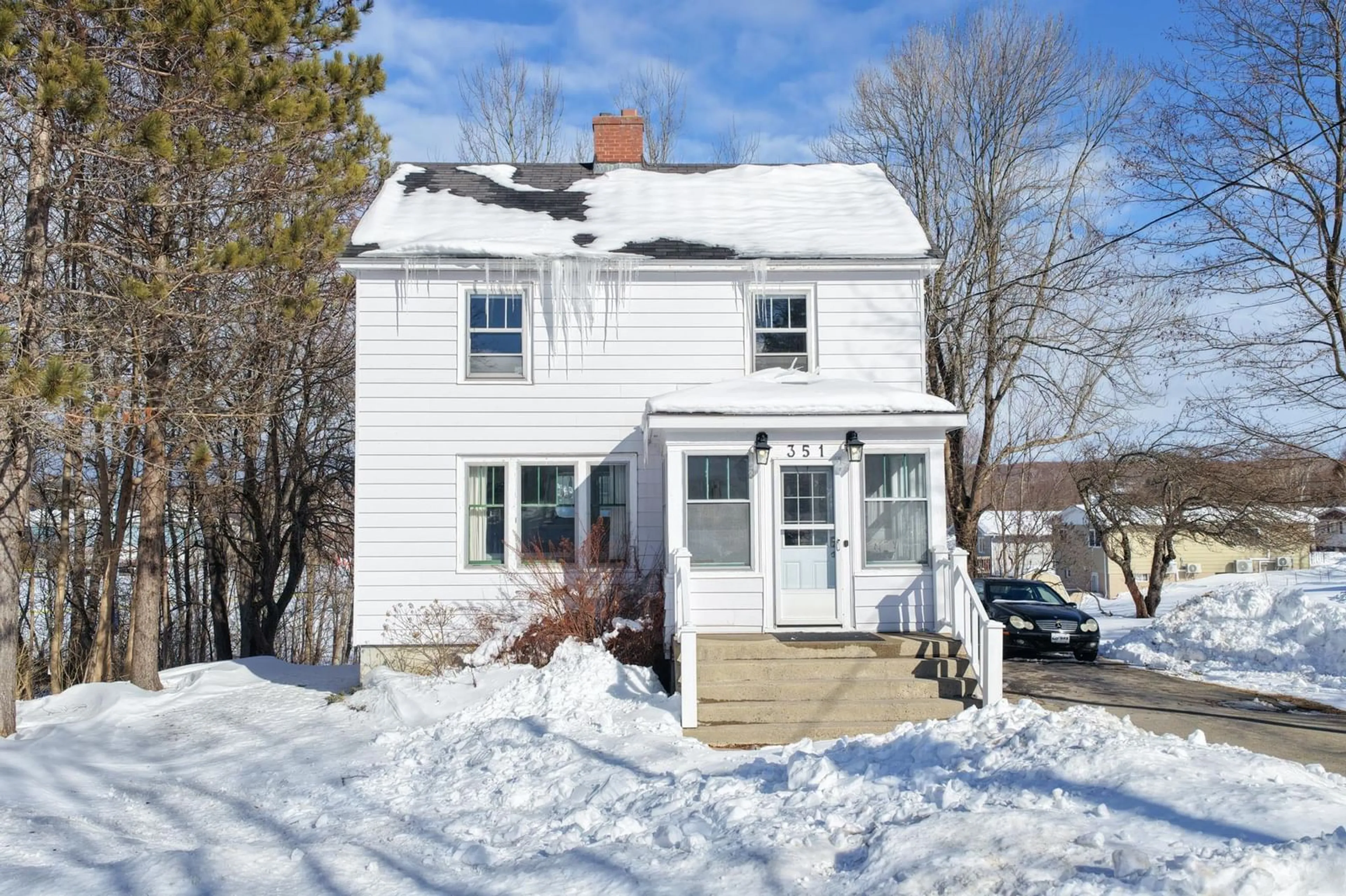 Home with vinyl exterior material, street for 351 Cottage Rd, Sydney Nova Scotia B1P 2E7