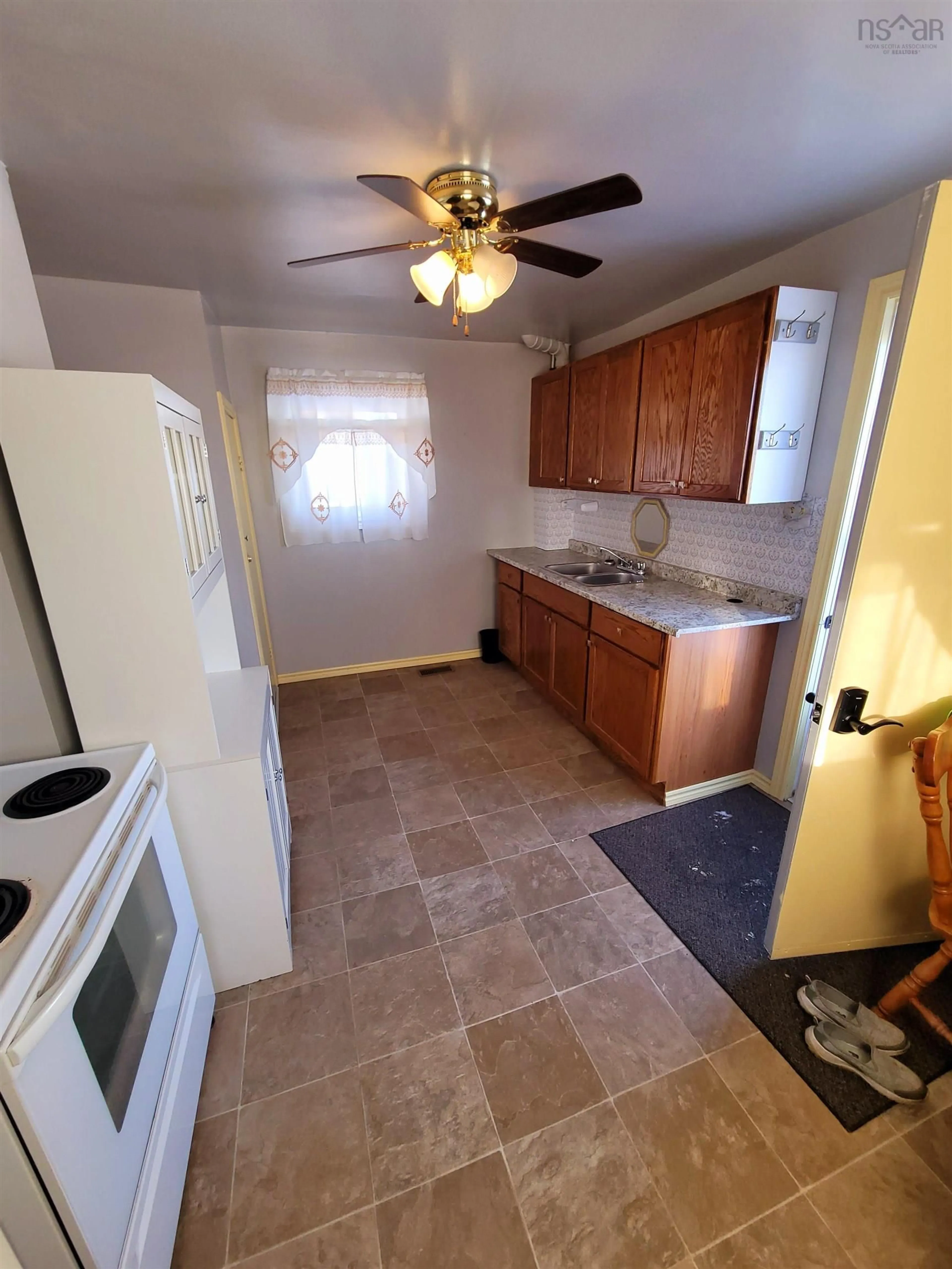 Standard kitchen, ceramic/tile floor for 21 Sydney St, Glace Bay Nova Scotia B1A 5J6