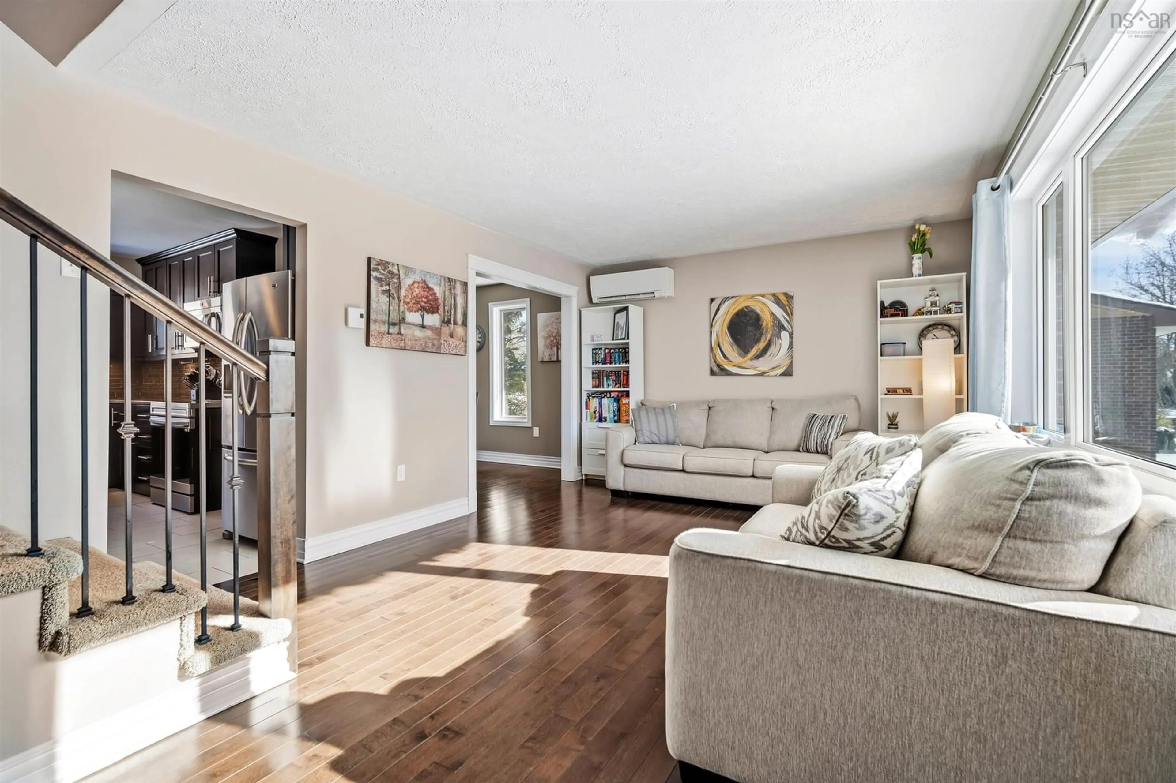 Living room with furniture, wood/laminate floor for 15 Bellroyal Crt, Cole Harbour Nova Scotia B2V 2B4