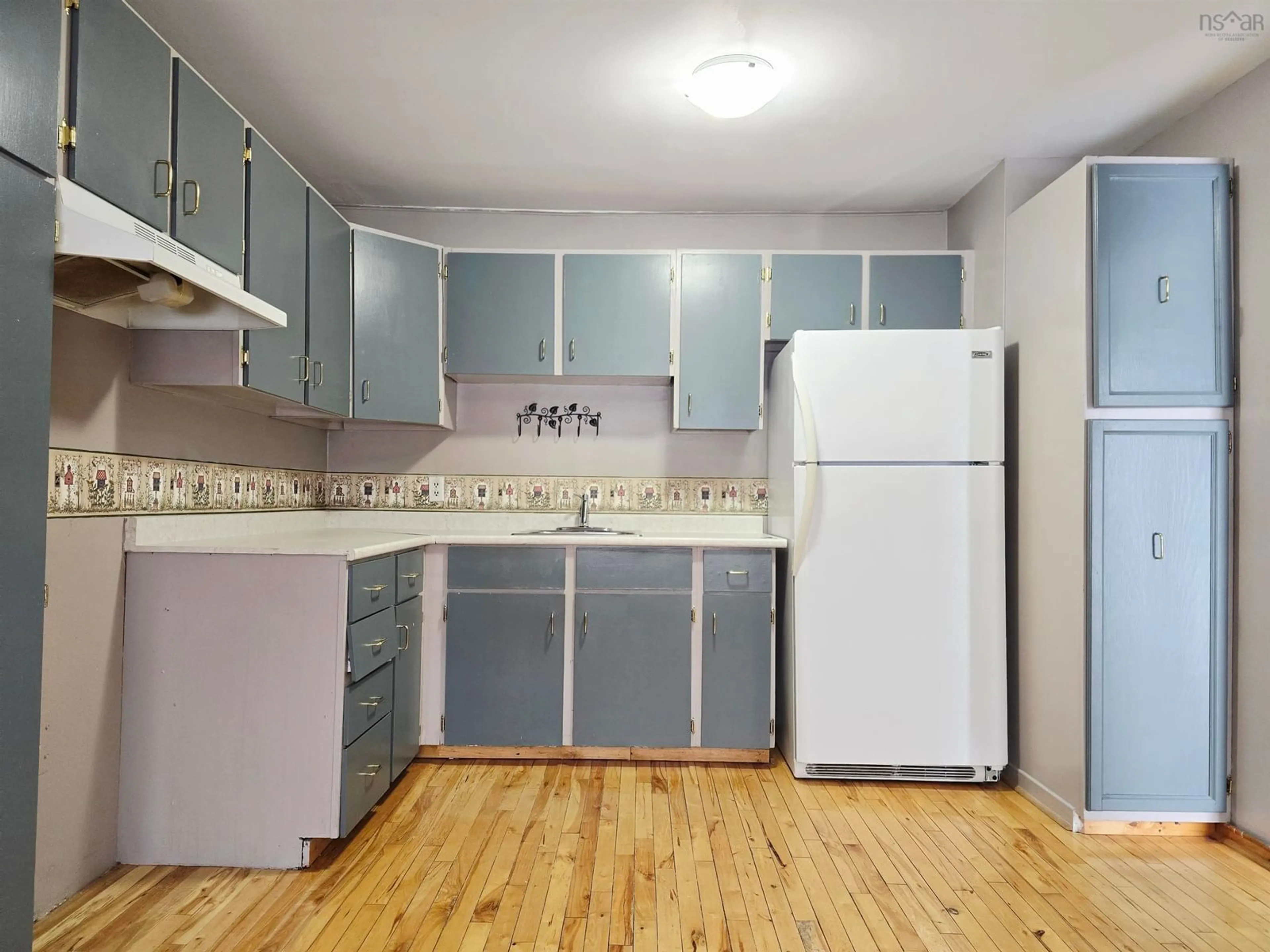 Standard kitchen, wood/laminate floor for 26 Maple St, Stellarton Nova Scotia B0K 1S0