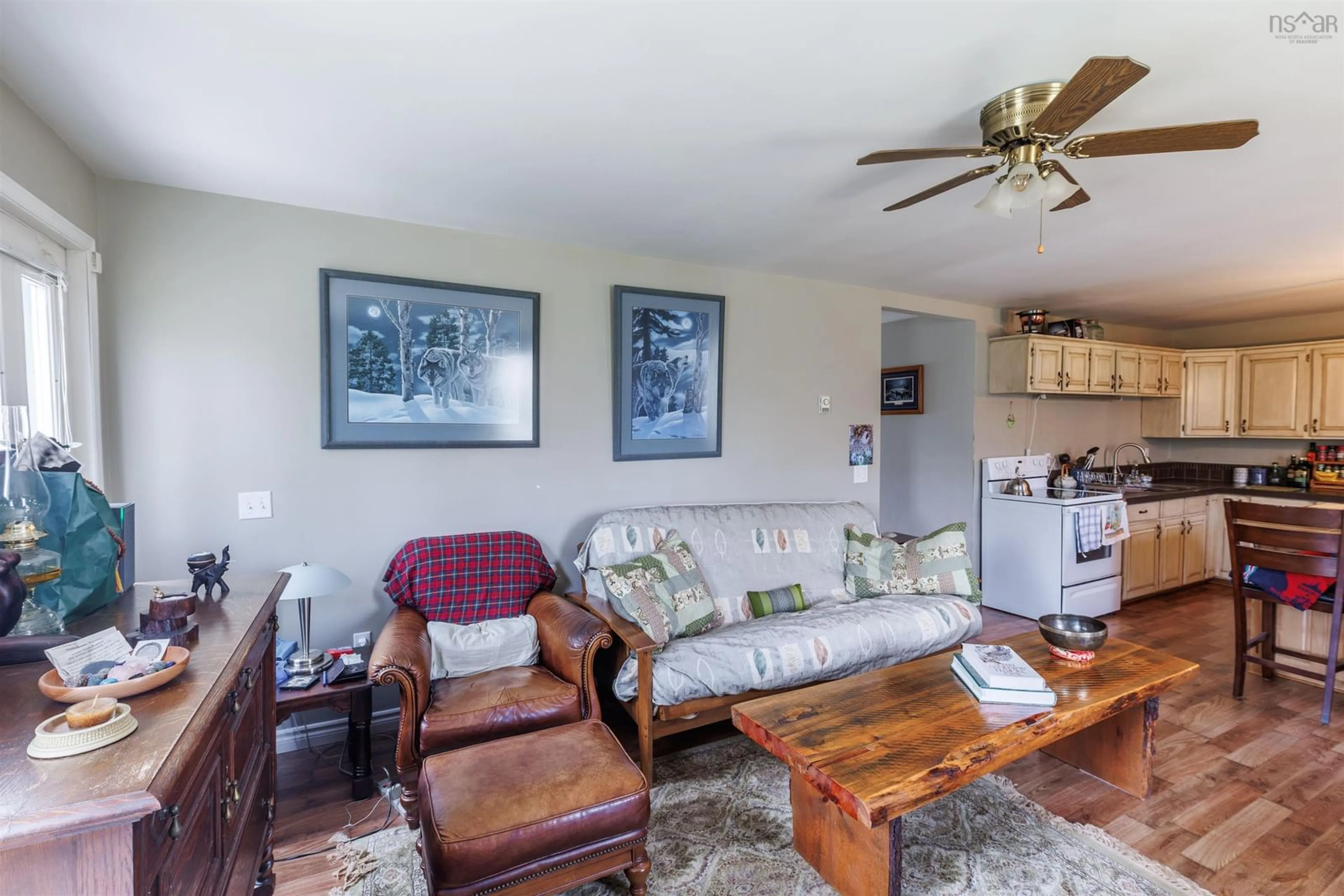 Living room with furniture, wood/laminate floor for 1657 Hectanooga Rd, Mayflower Nova Scotia B0W 2Y0