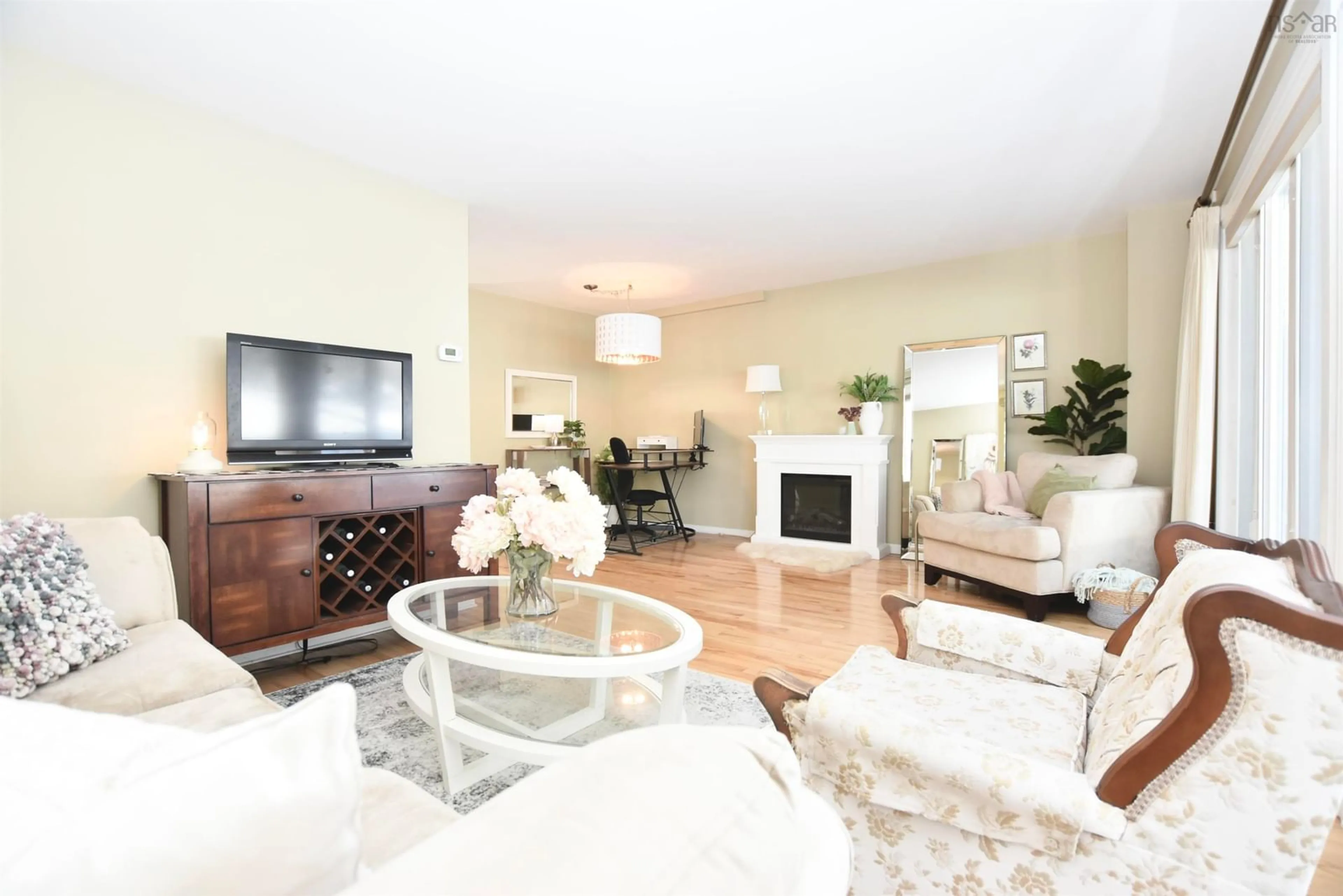 Living room with furniture, wood/laminate floor for 15 Braeside Lane, Halifax Nova Scotia B3M 3L6