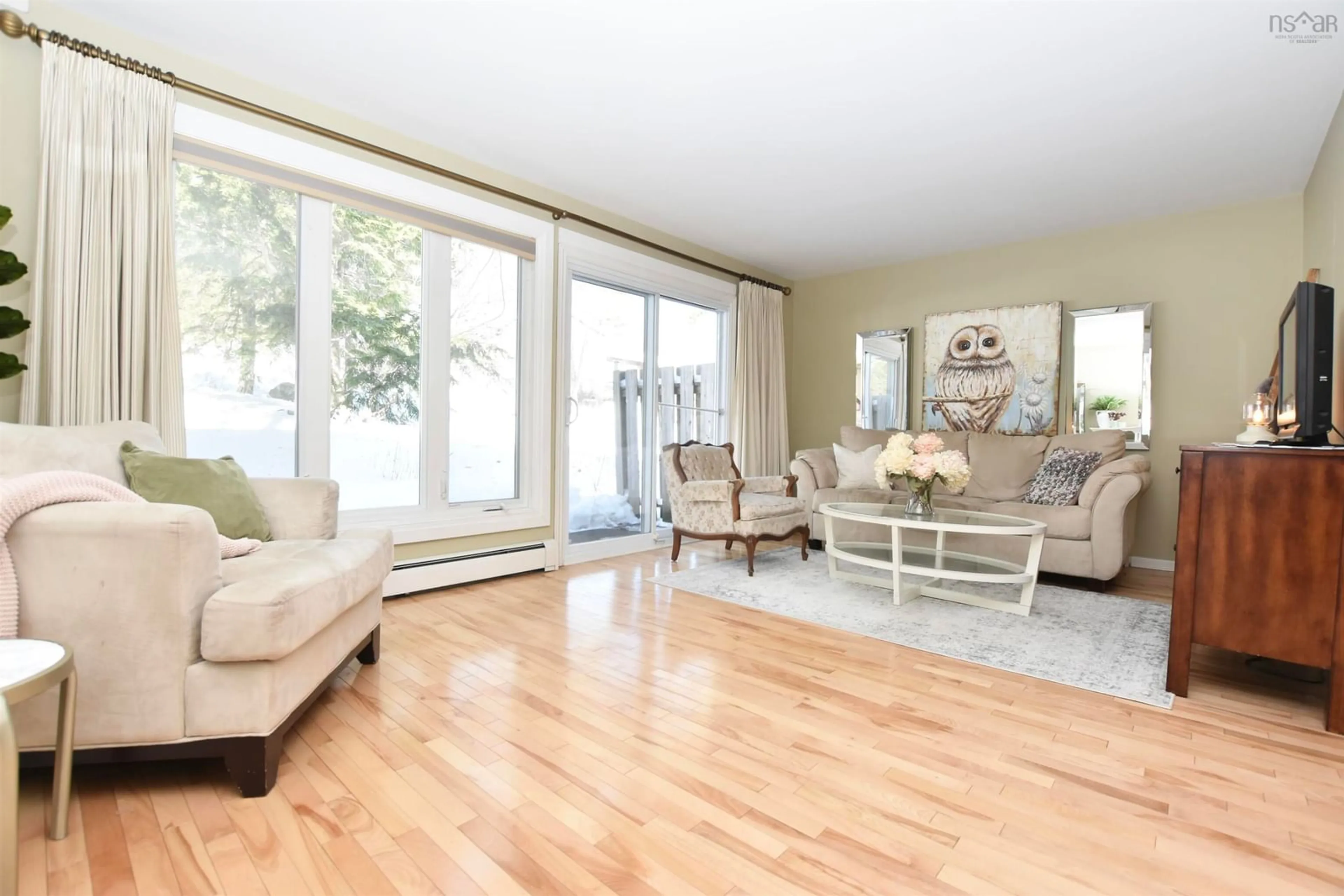 Living room with furniture, wood/laminate floor for 15 Braeside Lane, Halifax Nova Scotia B3M 3L6