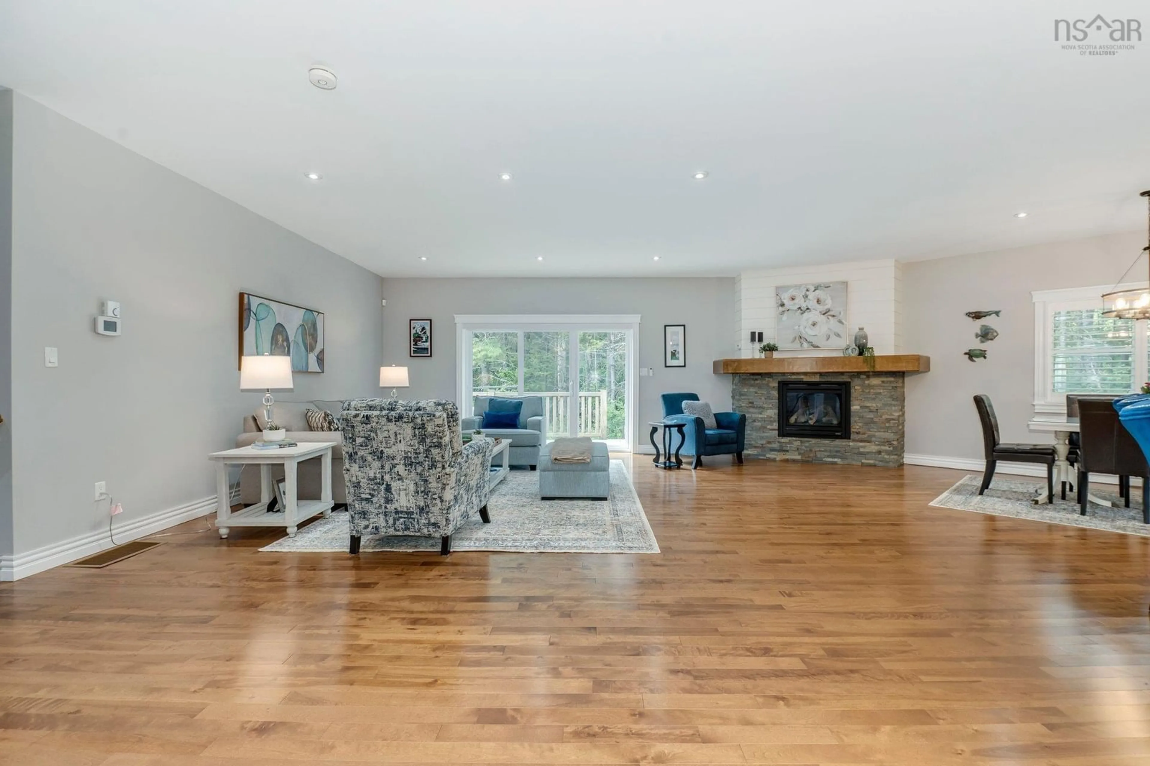 Living room with furniture, wood/laminate floor for 331 Masons Point Road, Head Of St. Margarets Bay Nova Scotia B3Z 1Z1