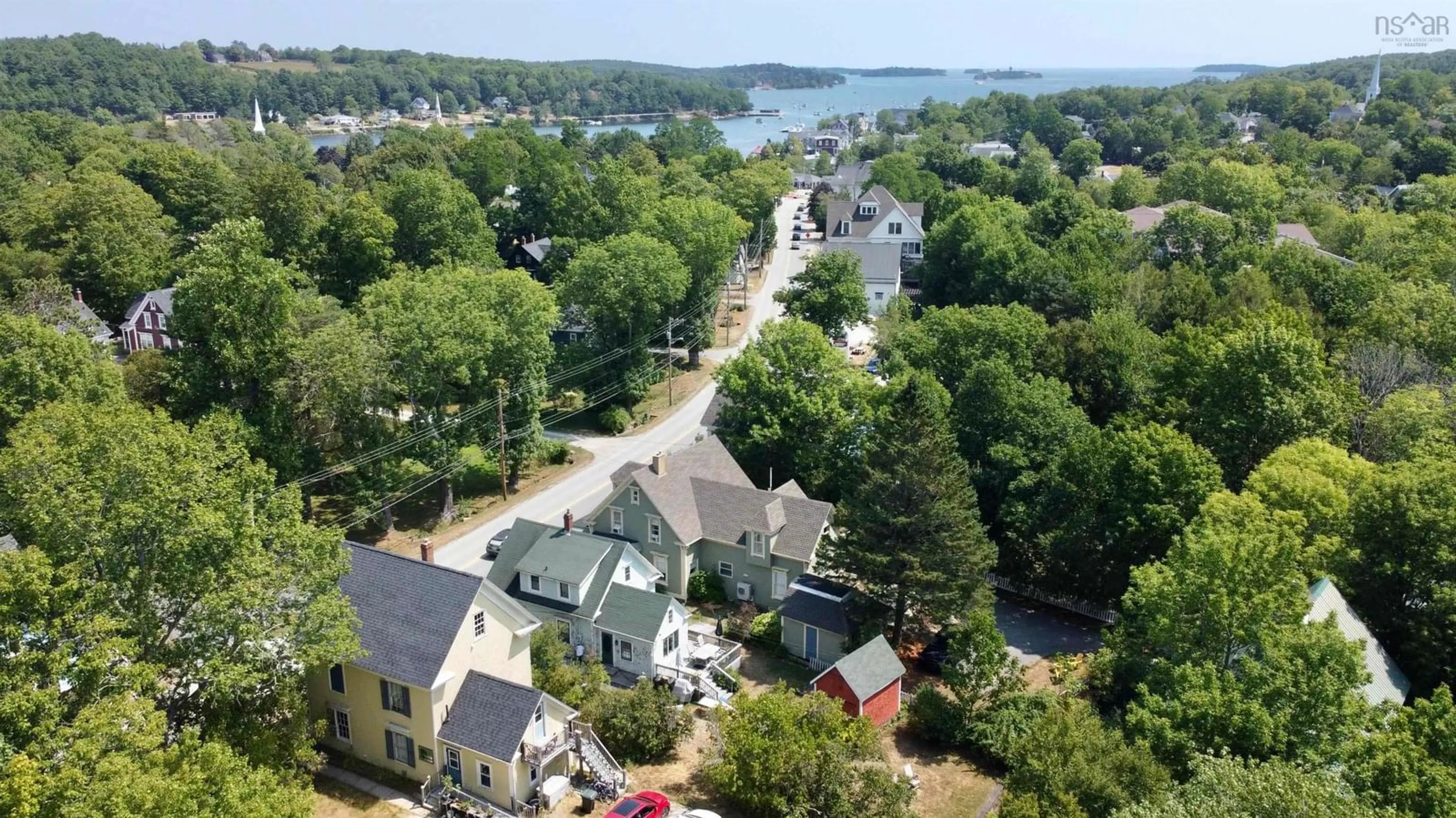 A pic from outside/outdoor area/front of a property/back of a property/a pic from drone, water/lake/river/ocean view for 424 Main St, Mahone Bay Nova Scotia B0J 2E0