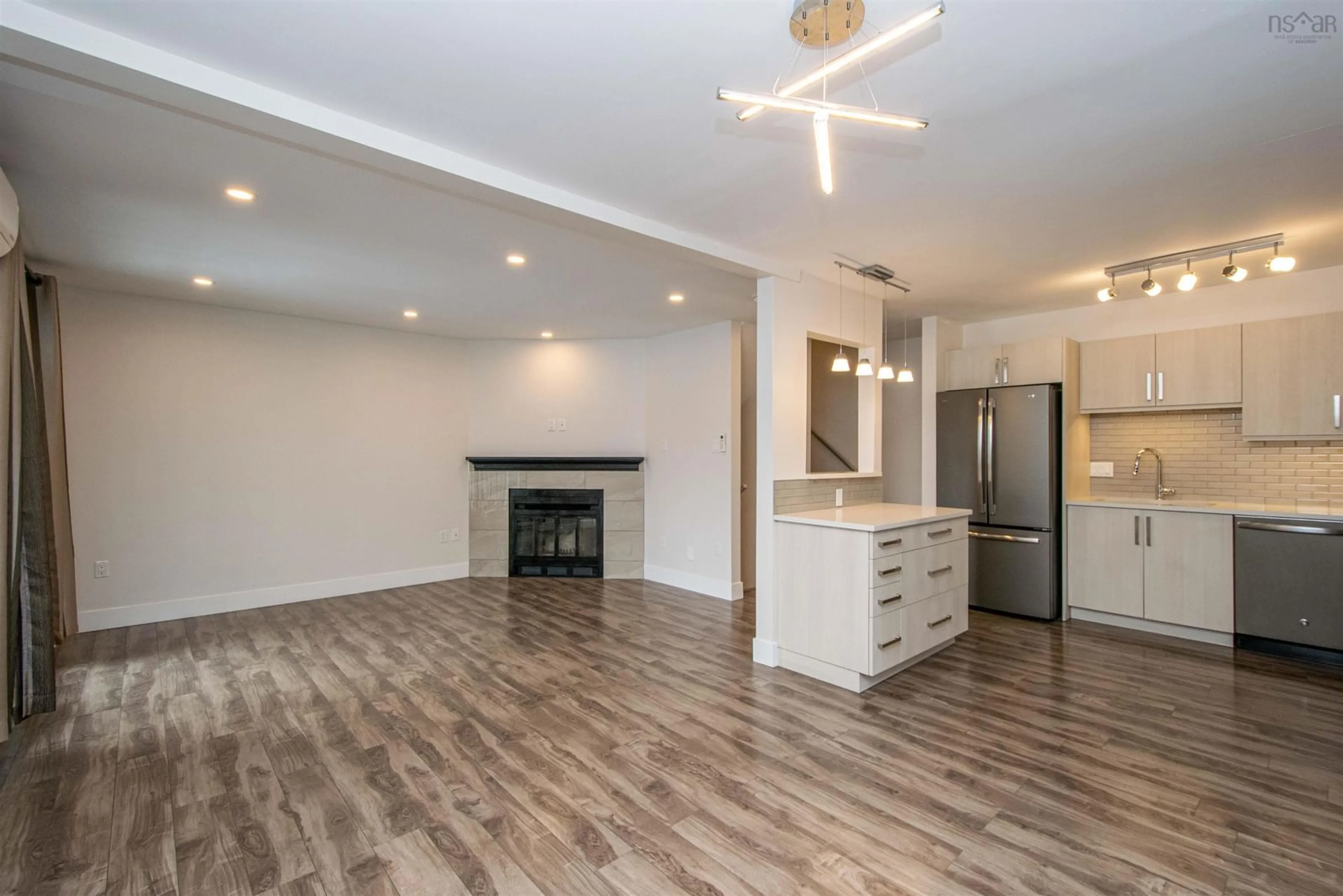 Open concept kitchen, wood/laminate floor for 5877 Gainsborough Pl, Halifax Nova Scotia B3K 5R7