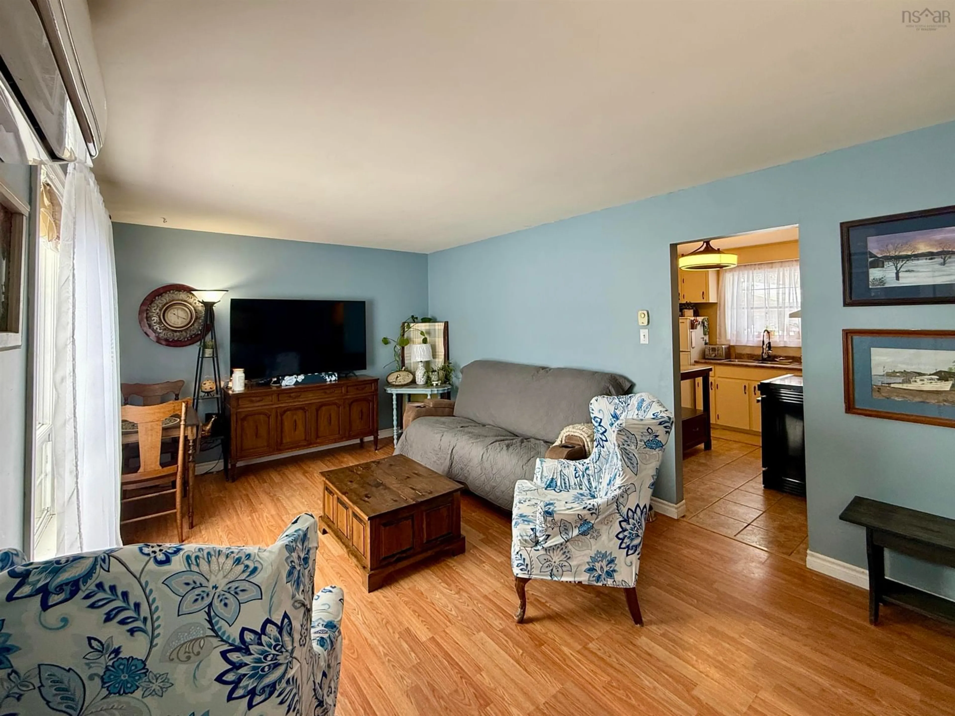 Living room with furniture, wood/laminate floor for 47 & 49 Geiger Dr, Wilmot Nova Scotia B0P 1R0