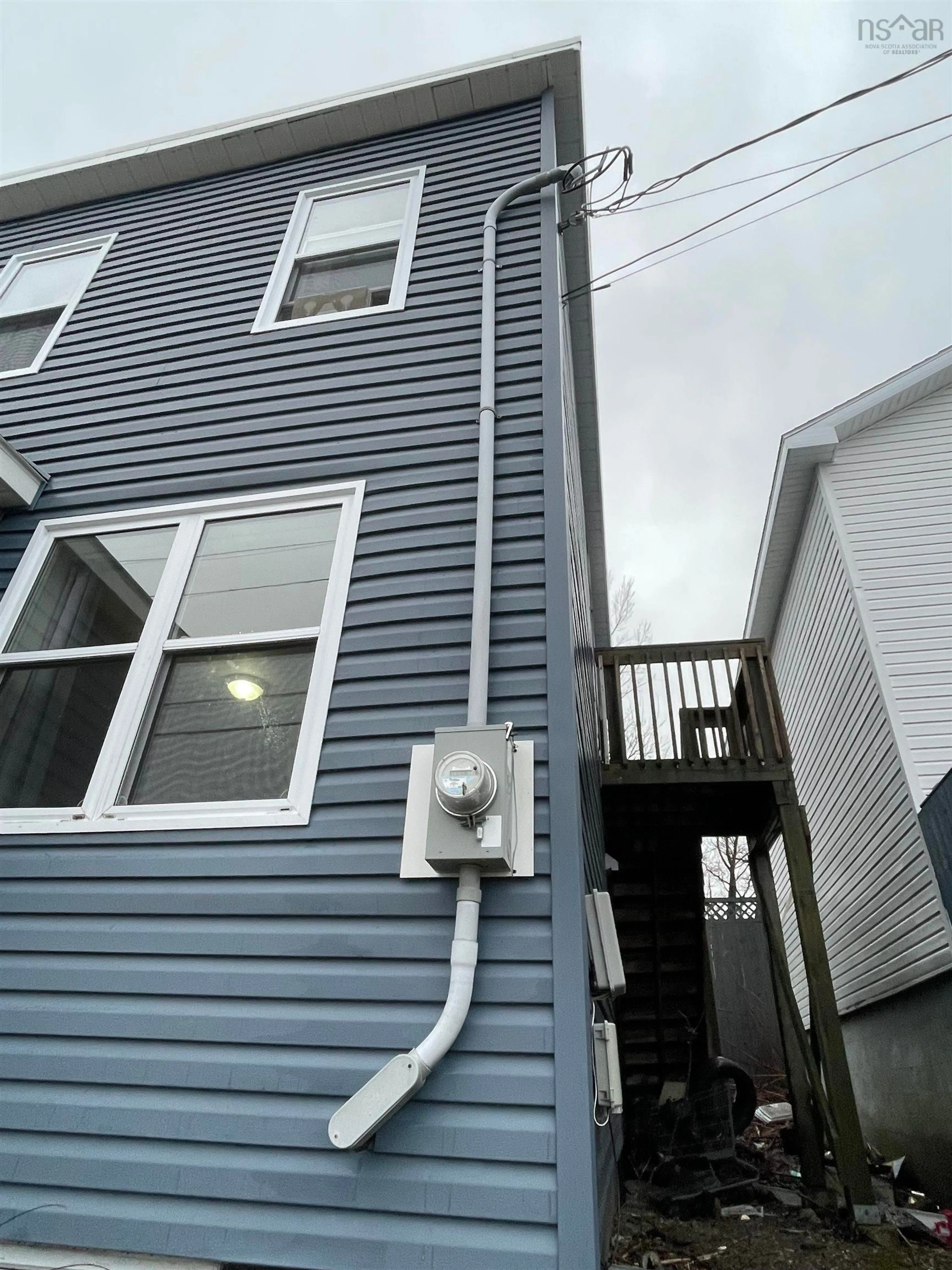 Home with vinyl exterior material, street for 104 Intercolonial St, Sydney Nova Scotia B1P 1S6