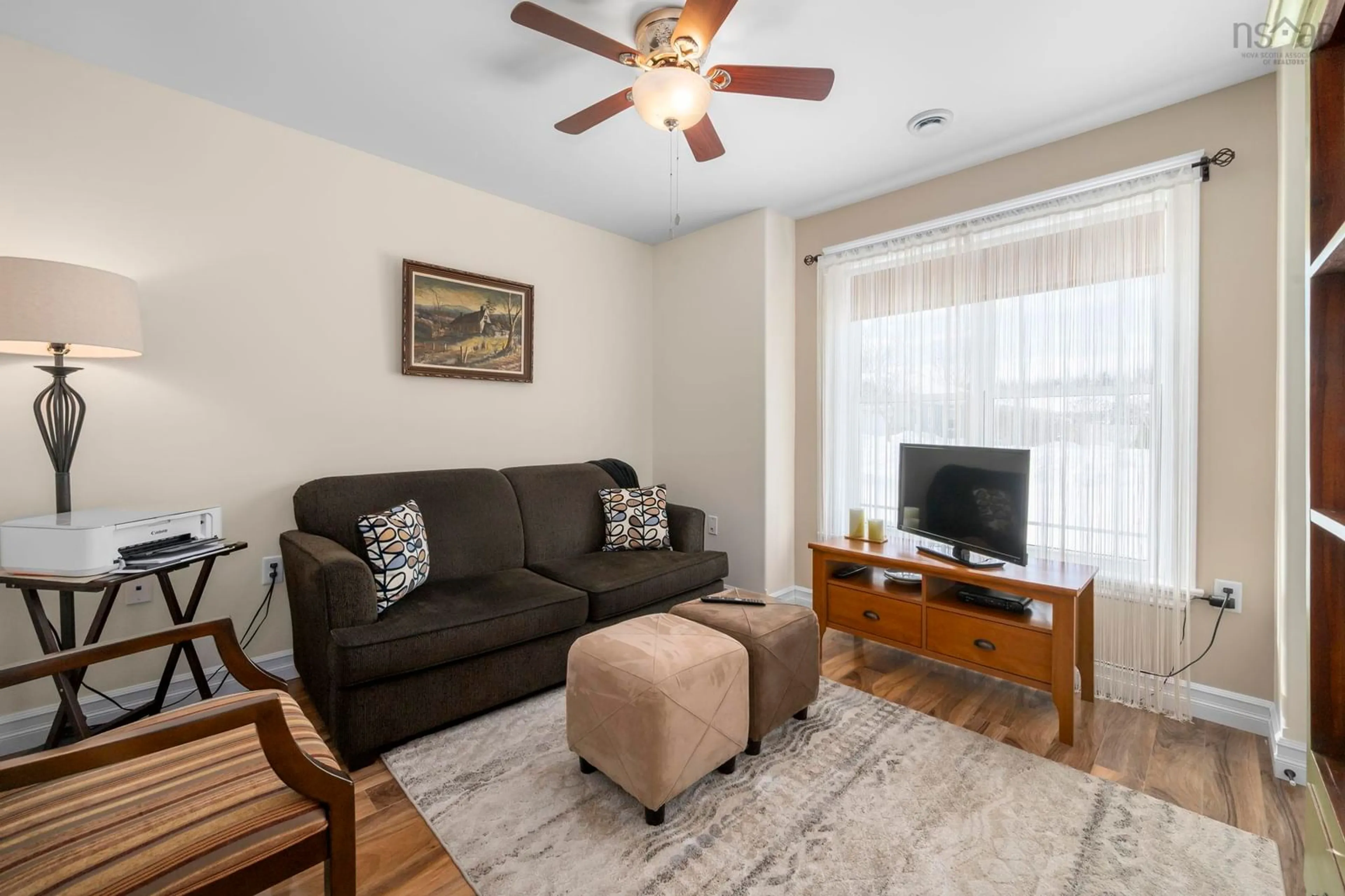 Living room with furniture, wood/laminate floor for 23 Beckwith Dr, Berwick Nova Scotia B0P 1E0