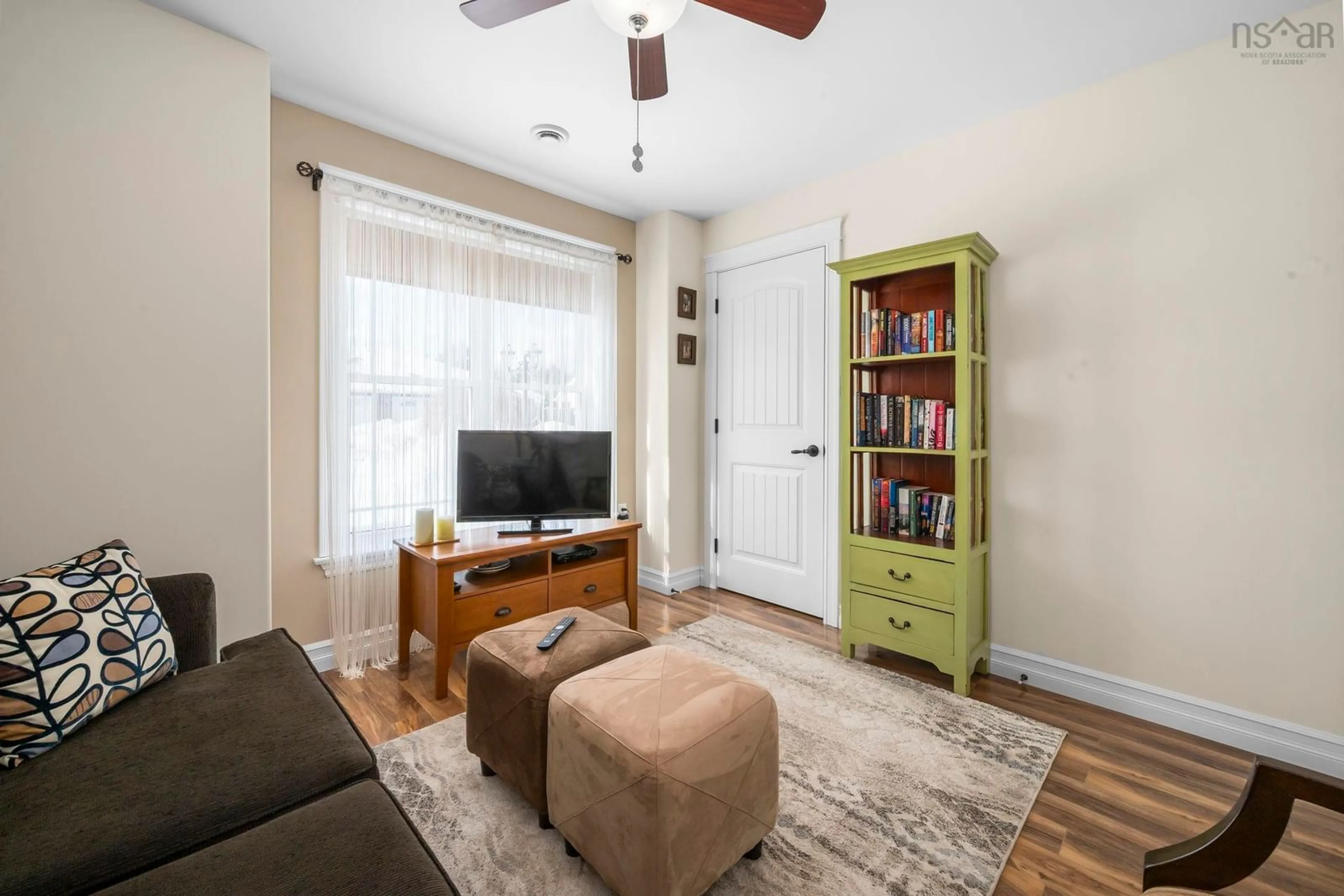 Living room with furniture, wood/laminate floor for 23 Beckwith Dr, Berwick Nova Scotia B0P 1E0