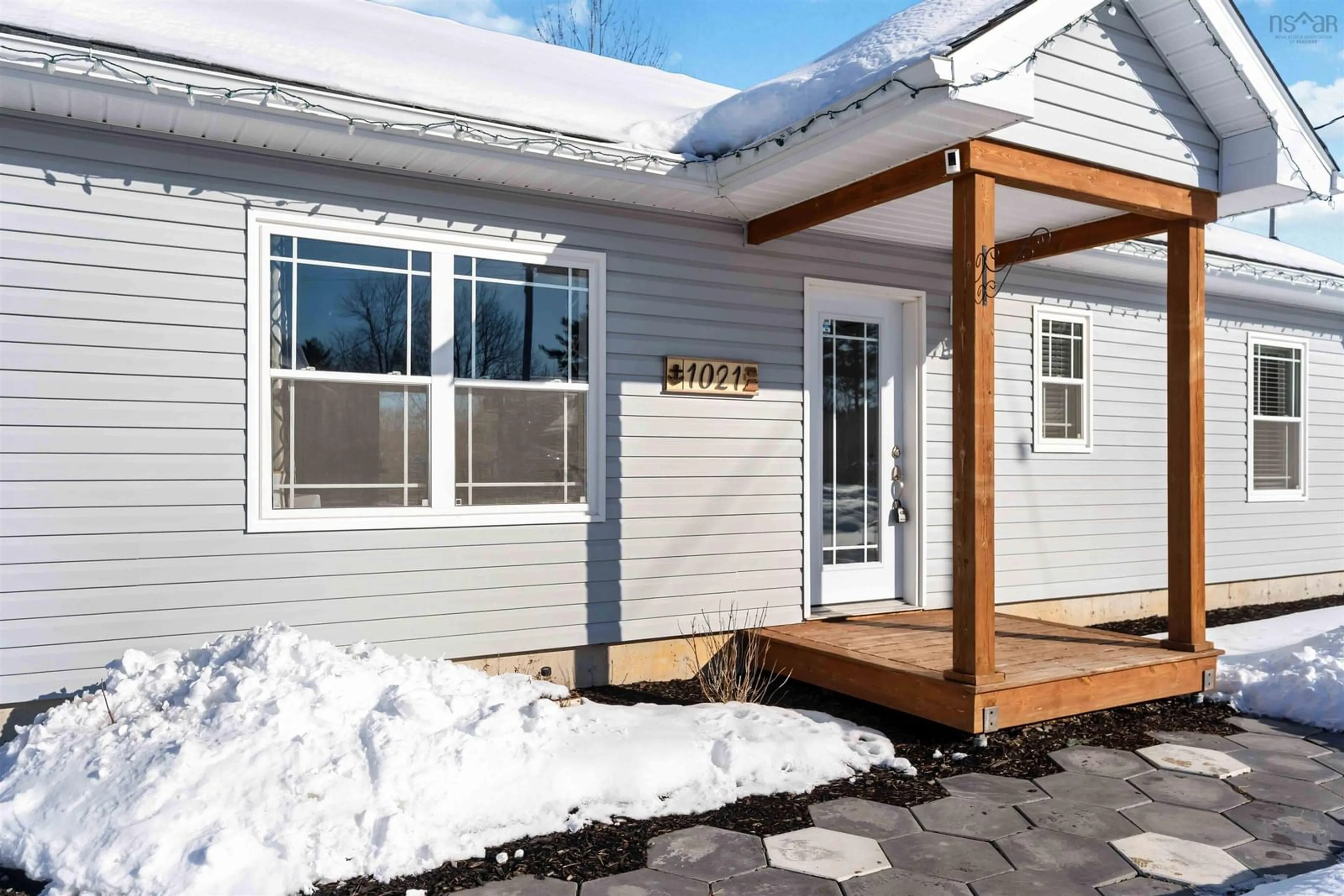 Home with vinyl exterior material, street for 1021 Arenburg Dr, Cambridge Nova Scotia B0P 1G0