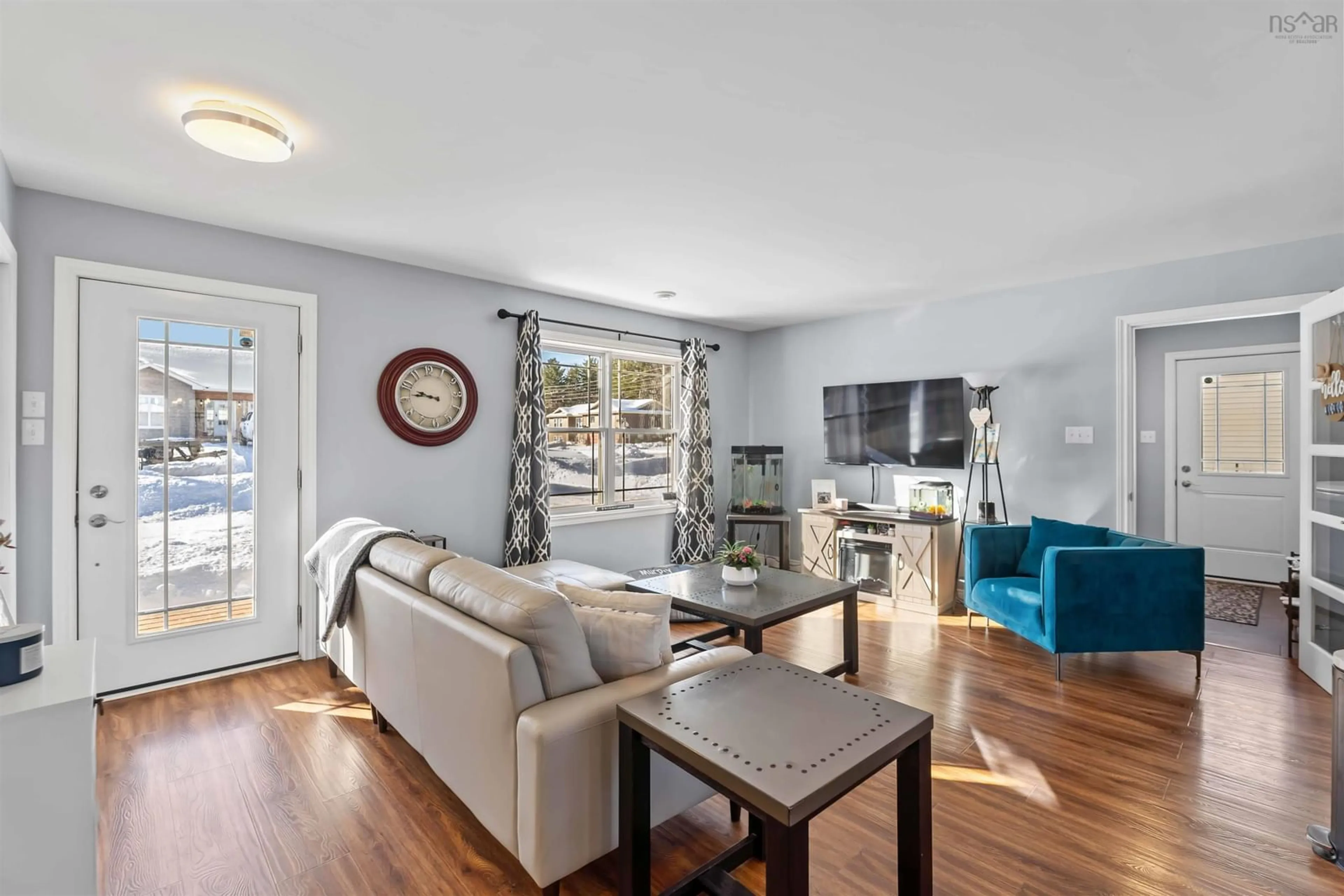 Living room with furniture, wood/laminate floor for 1021 Arenburg Dr, Cambridge Nova Scotia B0P 1G0