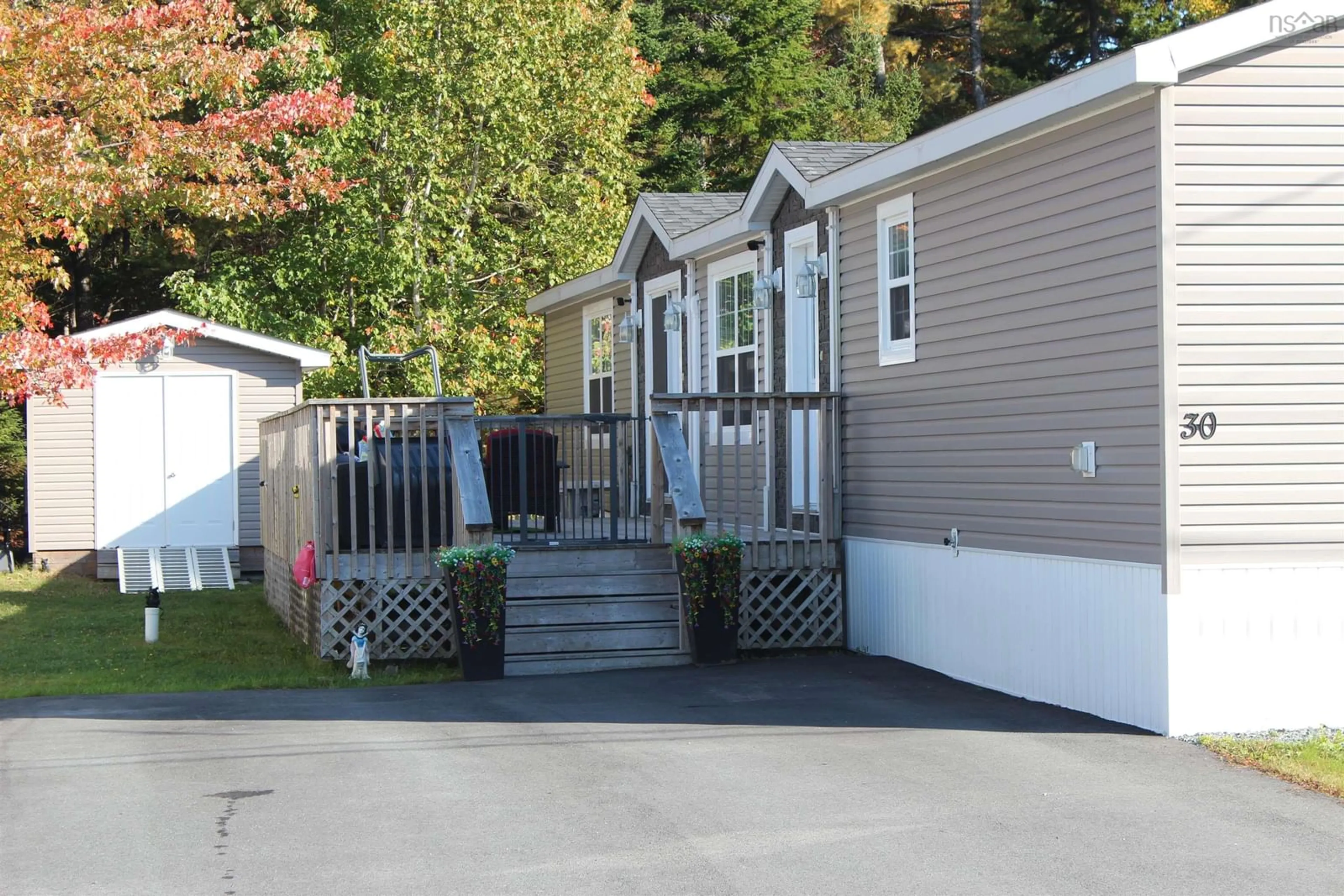 Home with vinyl exterior material, street for 30 Bumpy Lane, Lake Echo Nova Scotia B3E 1B8