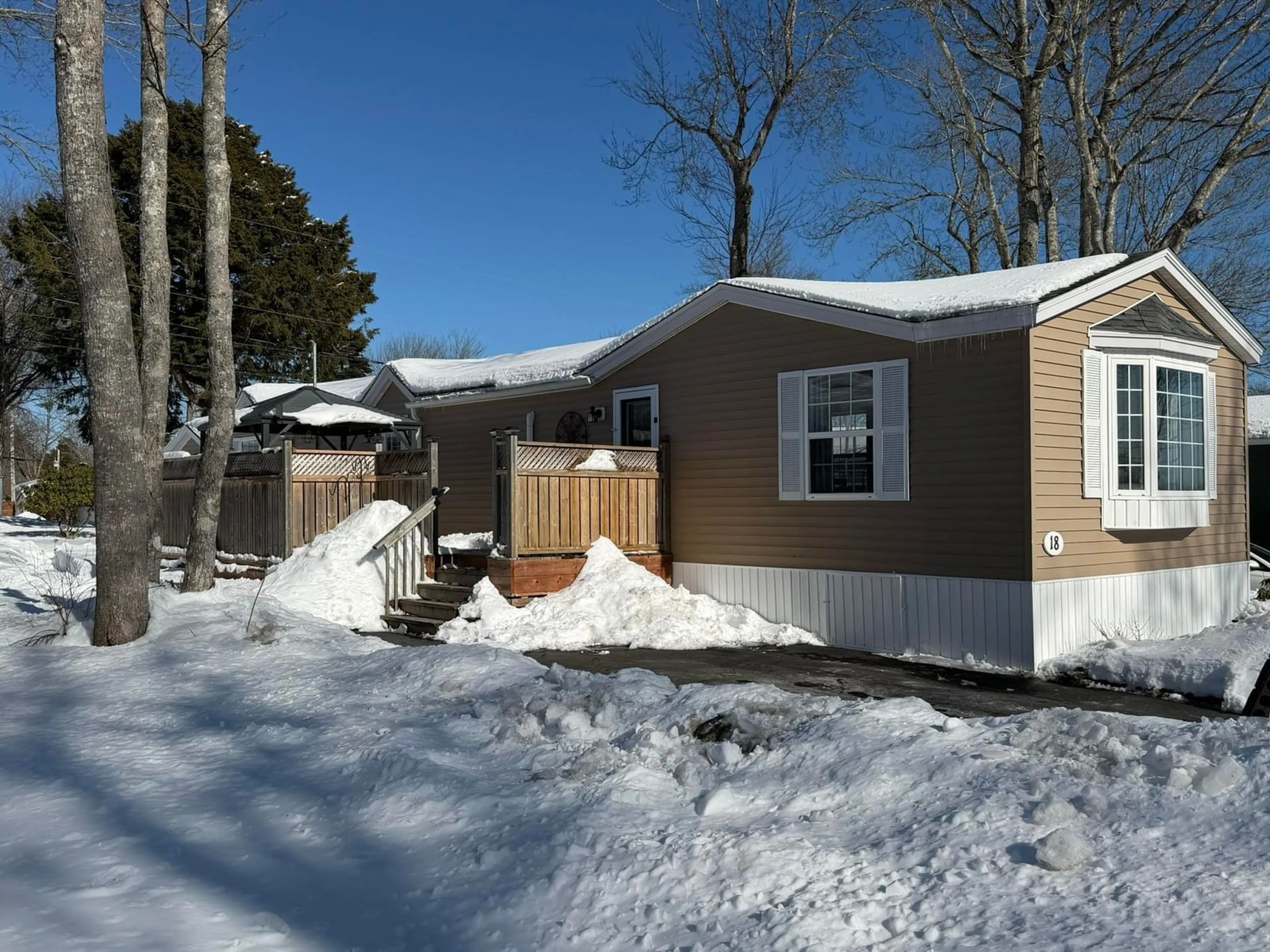Home with vinyl exterior material, street for 18 Seventh St, Lucasville Nova Scotia B4B 1R4