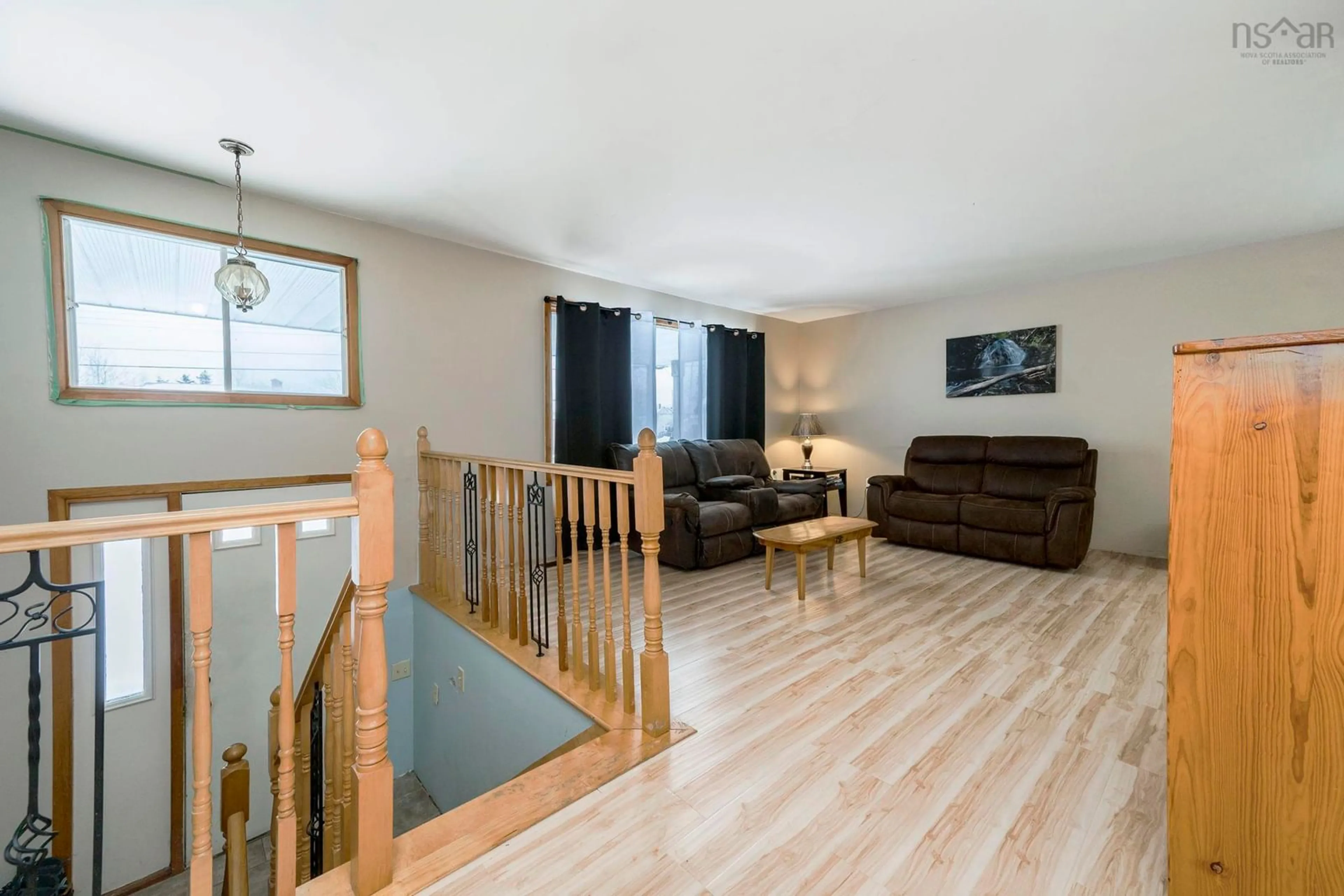 Living room with furniture, wood/laminate floor for 17 Wexford Rd, Cole Harbour Nova Scotia B2V 1R8