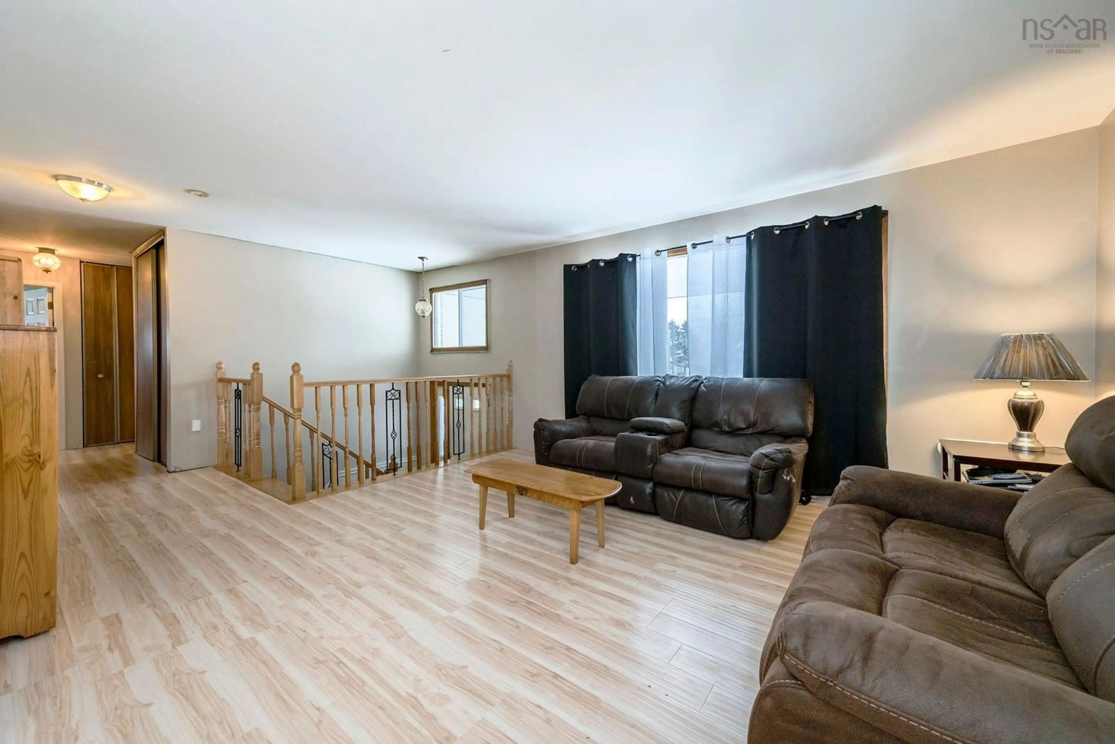 Living room with furniture, wood/laminate floor for 17 Wexford Rd, Cole Harbour Nova Scotia B2V 1R8