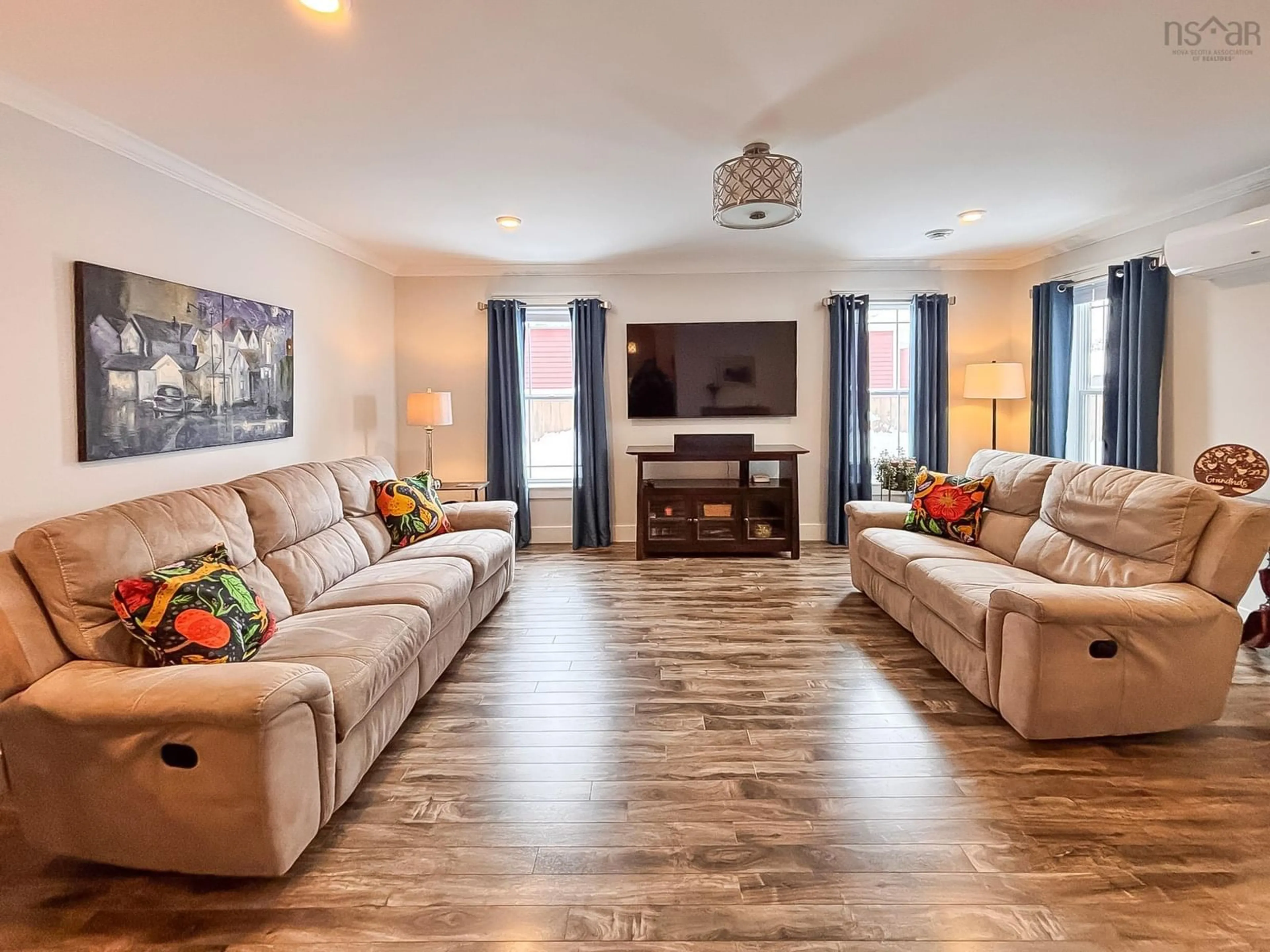 Living room with furniture, wood/laminate floor for 432 Glen Allan Dr, Bridgewater Nova Scotia B4V 0A8