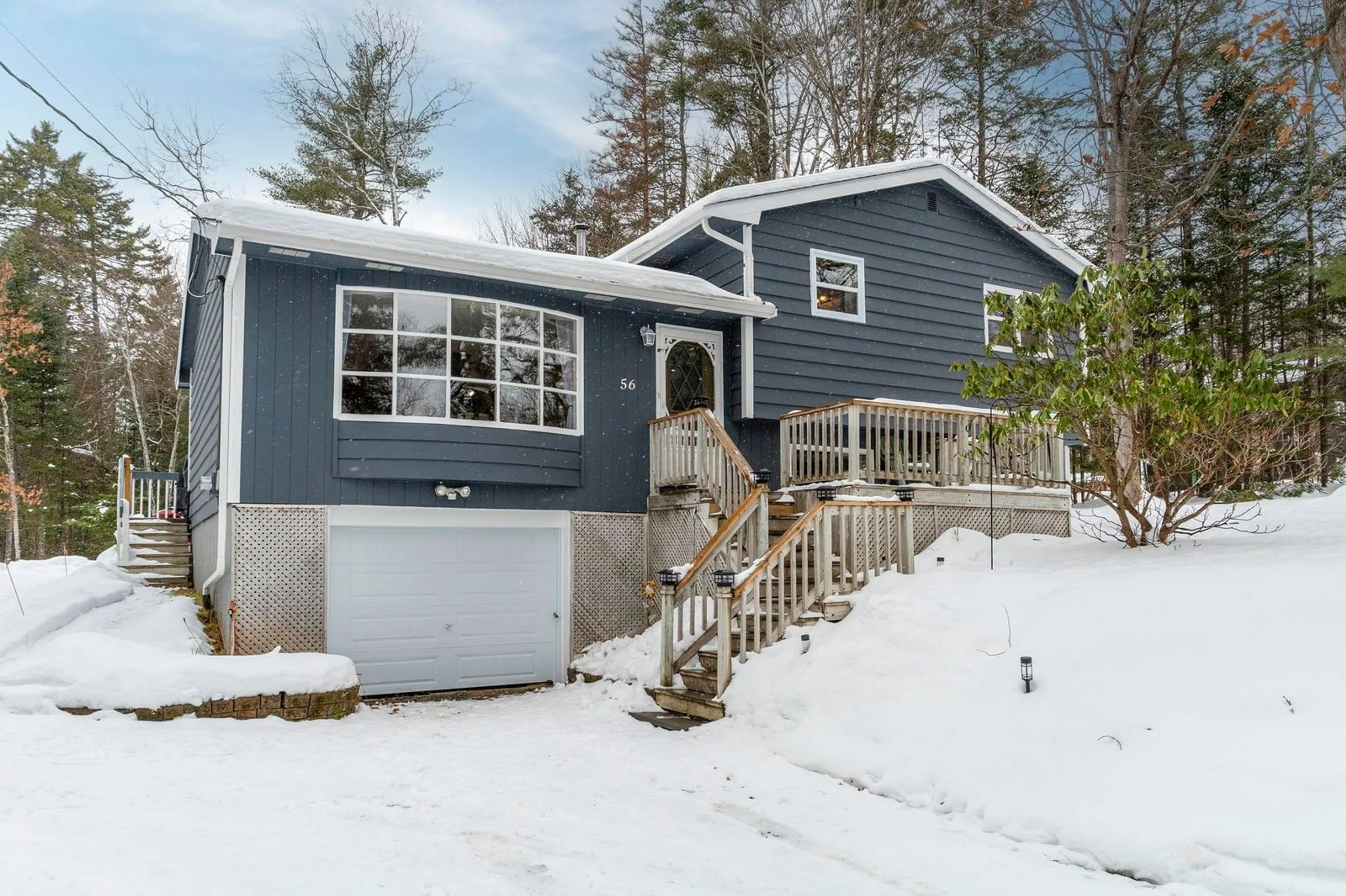 Home with vinyl exterior material, street for 56 Brook St, Fletchers Lake Nova Scotia B2T 1A5