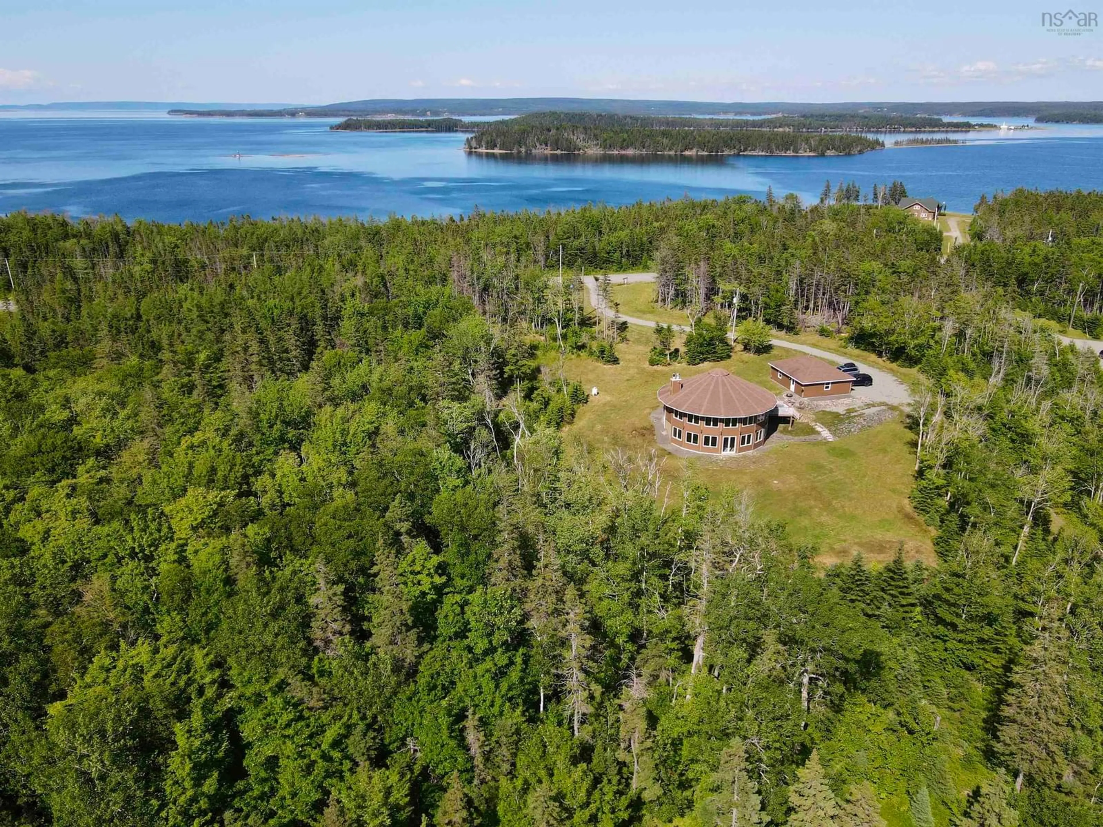 A pic from outside/outdoor area/front of a property/back of a property/a pic from drone, water/lake/river/ocean view for 458 Maple Dr, Cape George Nova Scotia B0E 3B0