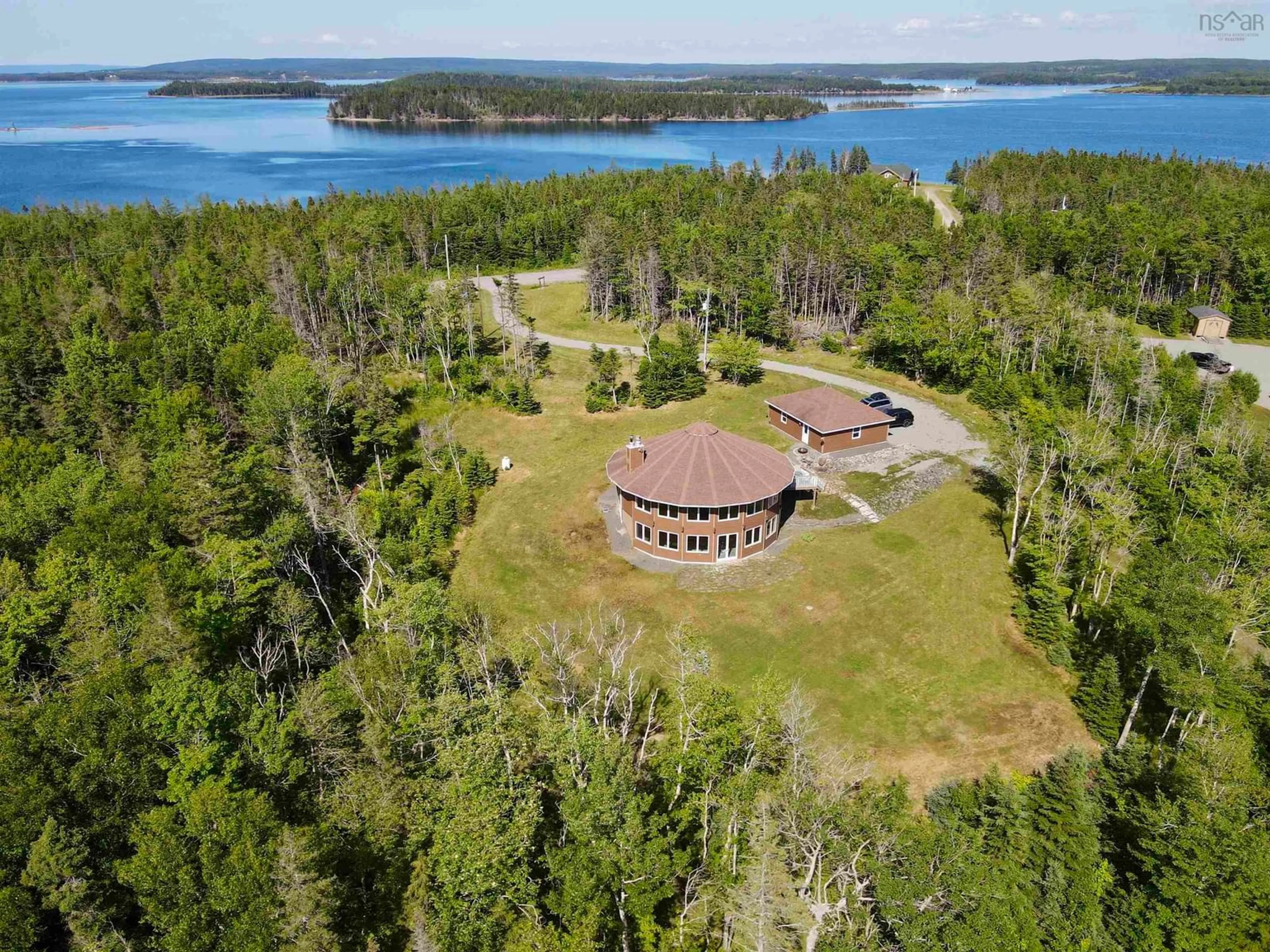 A pic from outside/outdoor area/front of a property/back of a property/a pic from drone, water/lake/river/ocean view for 458 Maple Dr, Cape George Nova Scotia B0E 3B0