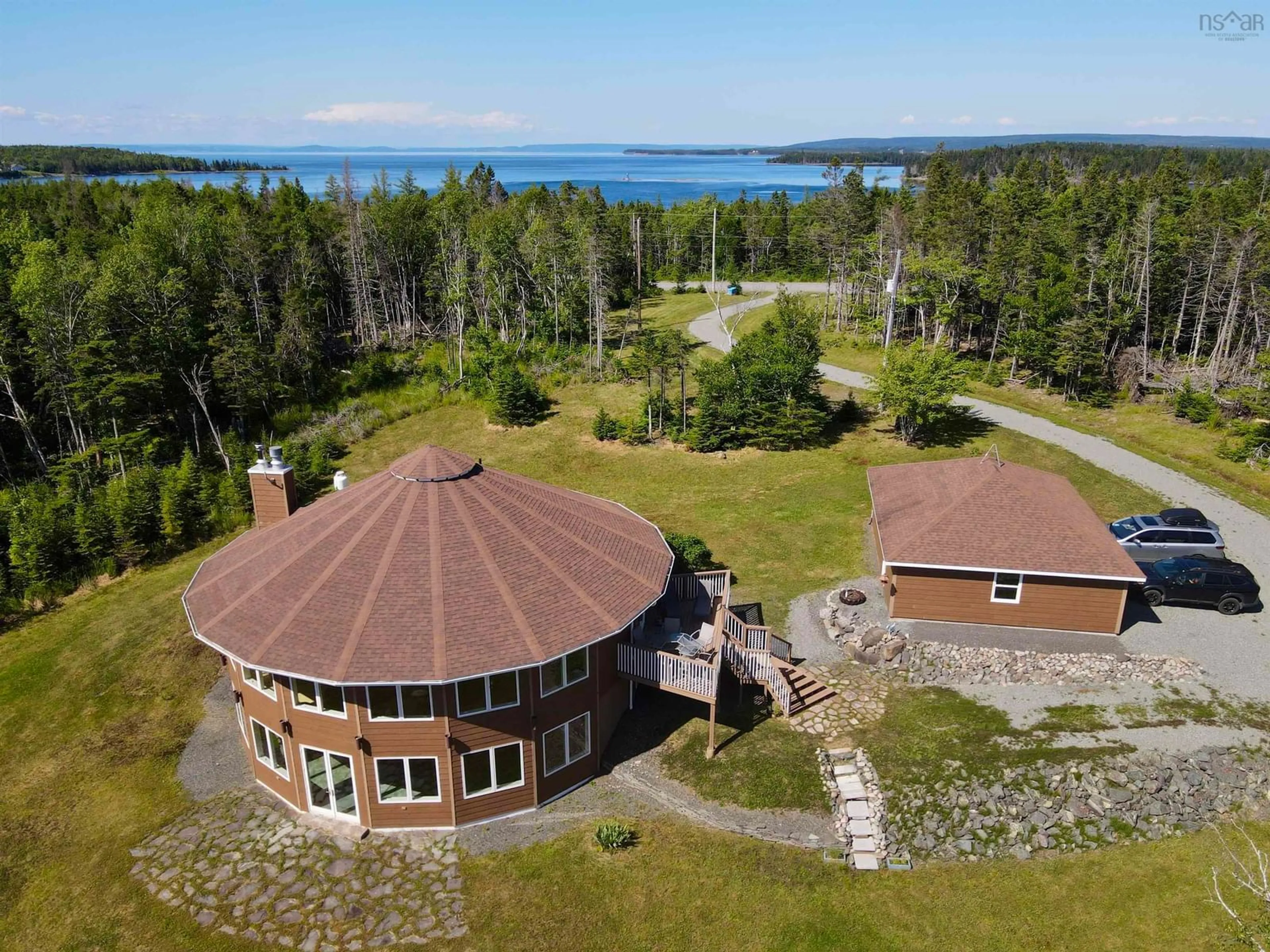 A pic from outside/outdoor area/front of a property/back of a property/a pic from drone, water/lake/river/ocean view for 458 Maple Dr, Cape George Nova Scotia B0E 3B0