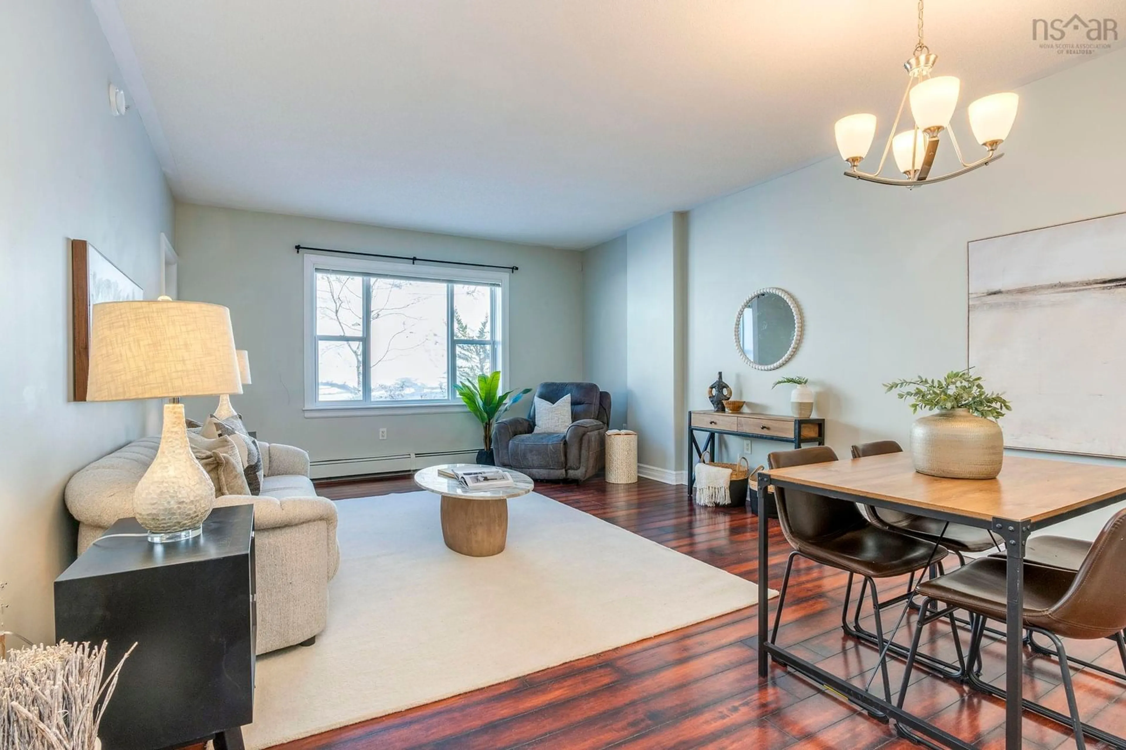 Living room with furniture, wood/laminate floor for 767 Parkland Dr #108, Halifax Nova Scotia B3S 1T1