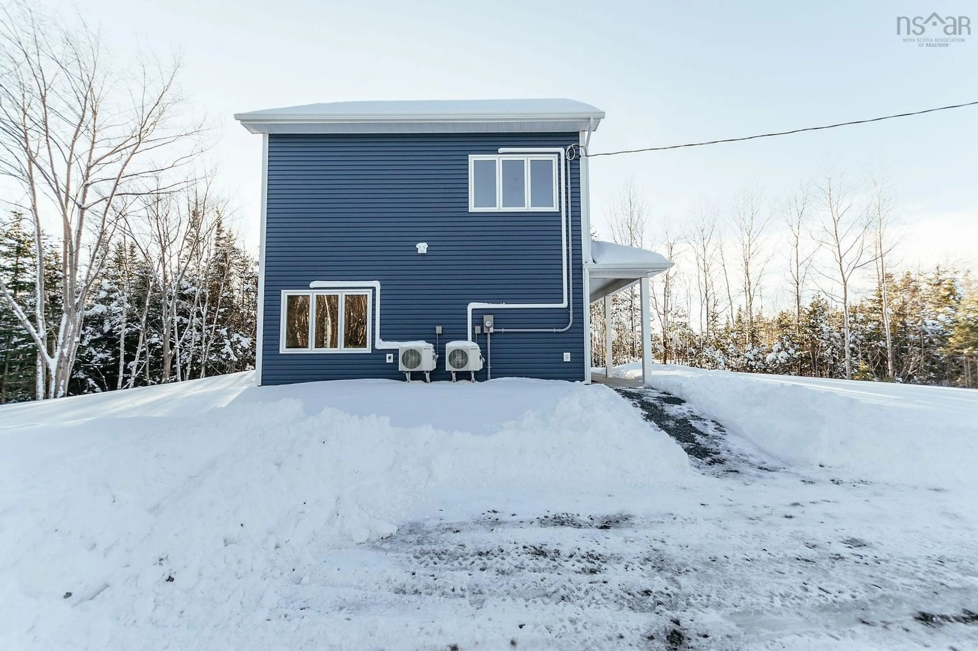 A pic from outside/outdoor area/front of a property/back of a property/a pic from drone, street for 25 Jan Marie Dr, Lawrencetown Nova Scotia B2Z 1E2
