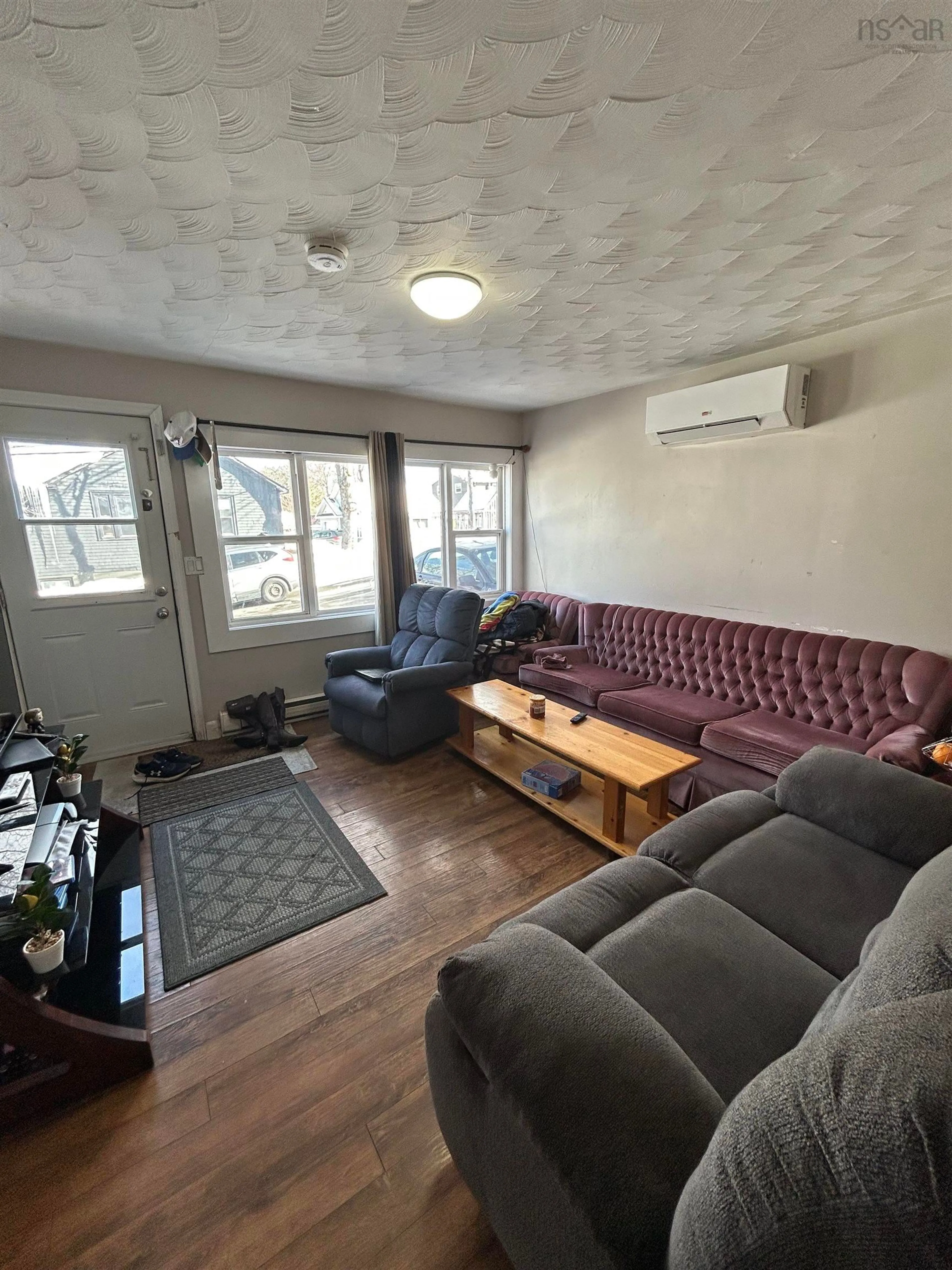 Living room with furniture, unknown for 24 Rosemount Dr, Sydney Nova Scotia B1S 1W5