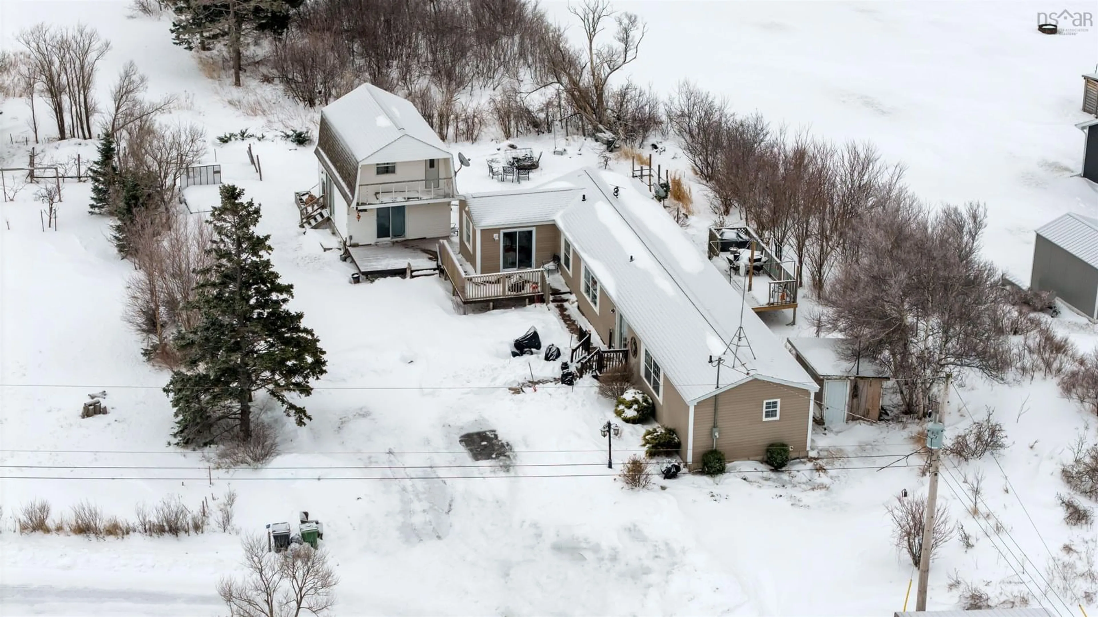 A pic from outside/outdoor area/front of a property/back of a property/a pic from drone, street for 55 Dan R Dr, Pugwash Nova Scotia B0K 1L0