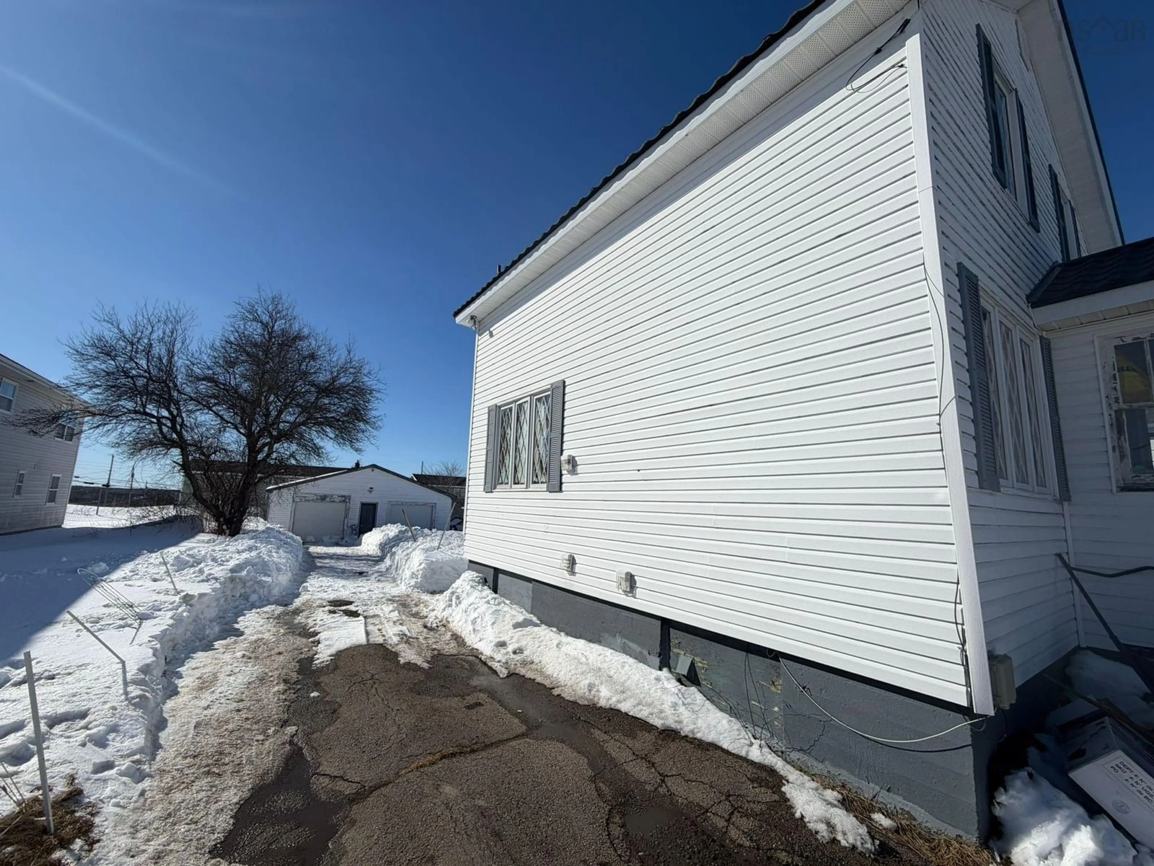 A pic from outside/outdoor area/front of a property/back of a property/a pic from drone, building for 1162 George St, Sydney Nova Scotia B1P 1N2