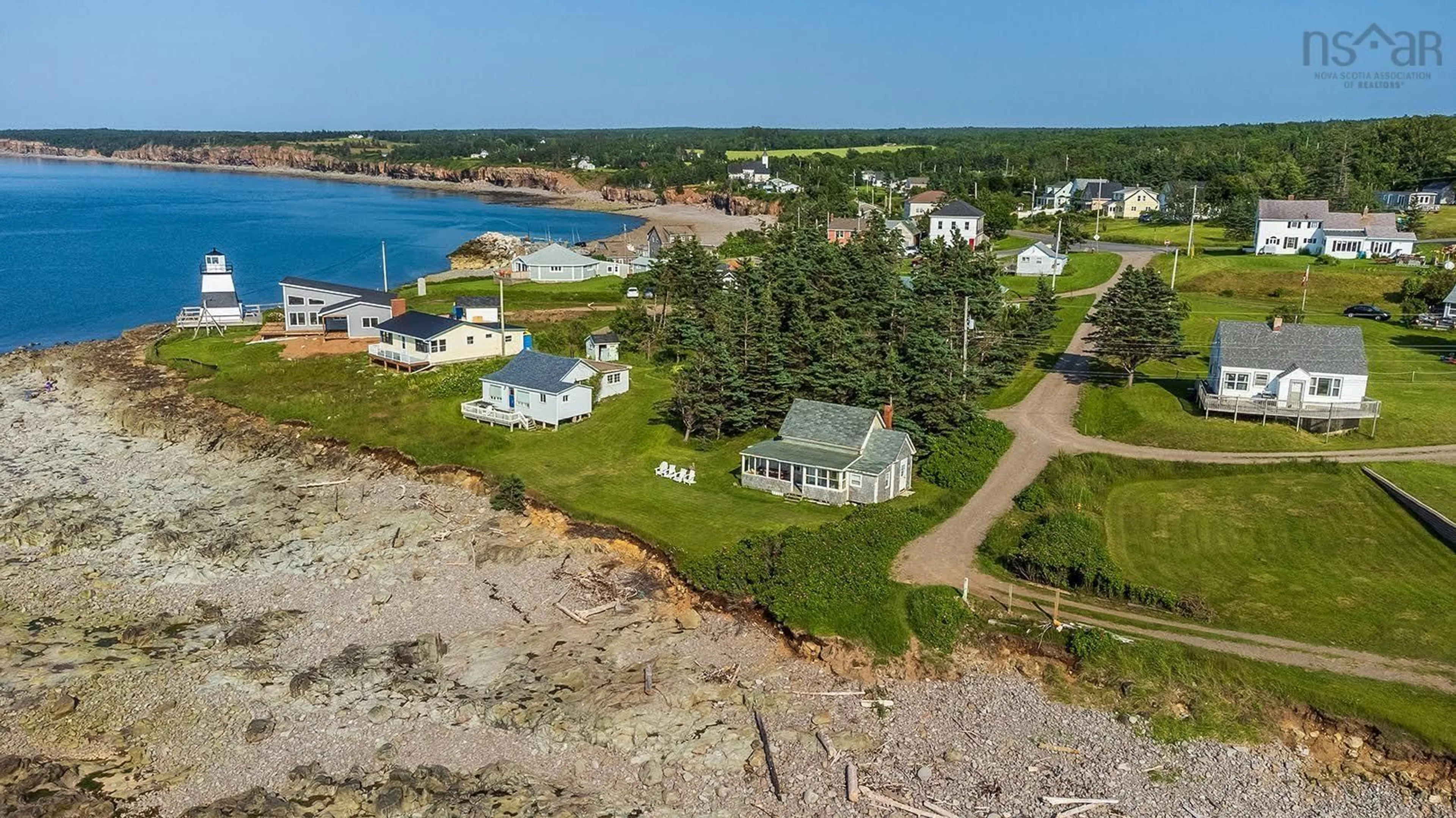 A pic from outside/outdoor area/front of a property/back of a property/a pic from drone, water/lake/river/ocean view for 3 Gordon Rd, Margaretsville Nova Scotia B0S 1N0