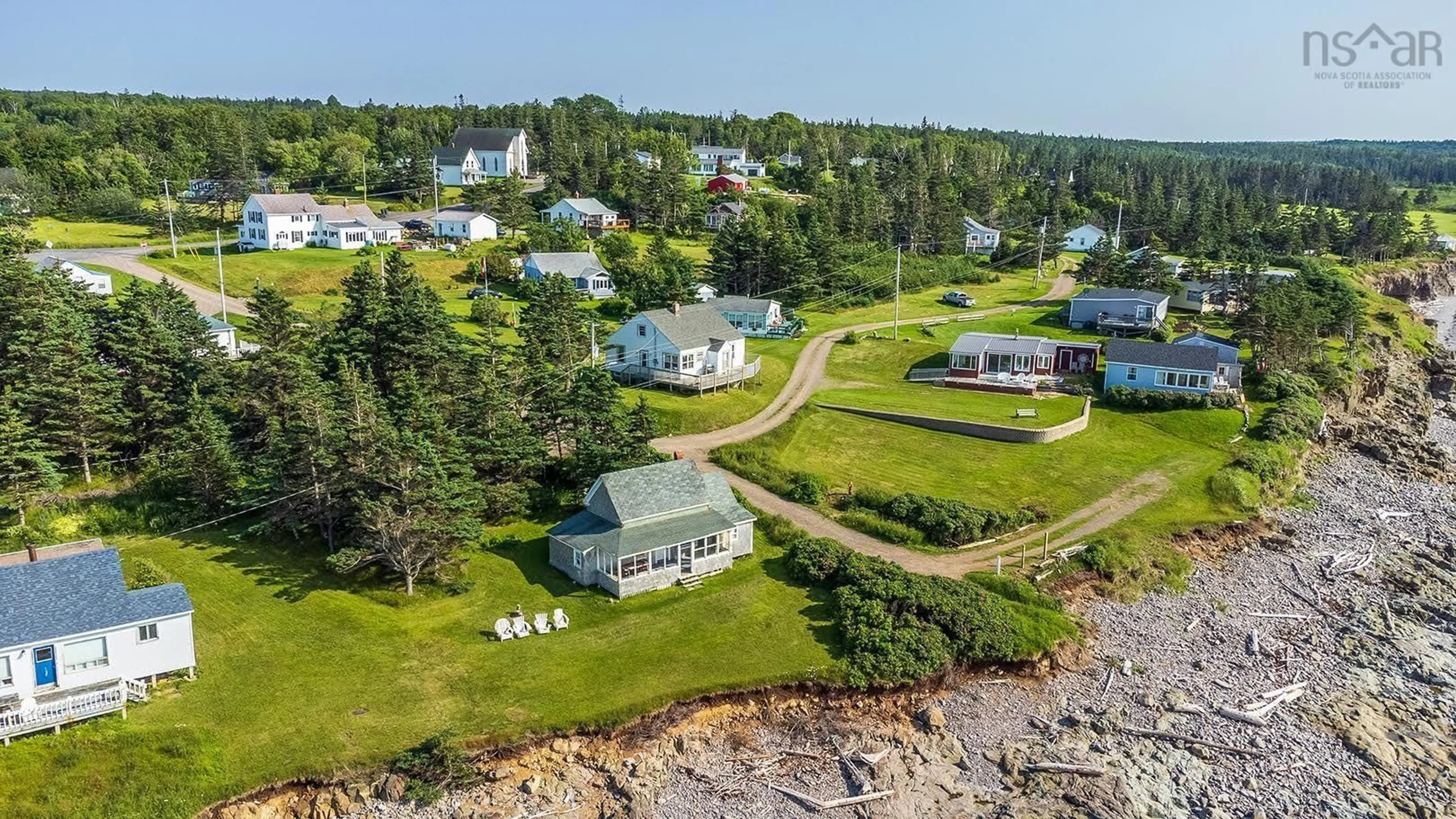 A pic from outside/outdoor area/front of a property/back of a property/a pic from drone, water/lake/river/ocean view for 3 Gordon Rd, Margaretsville Nova Scotia B0S 1N0