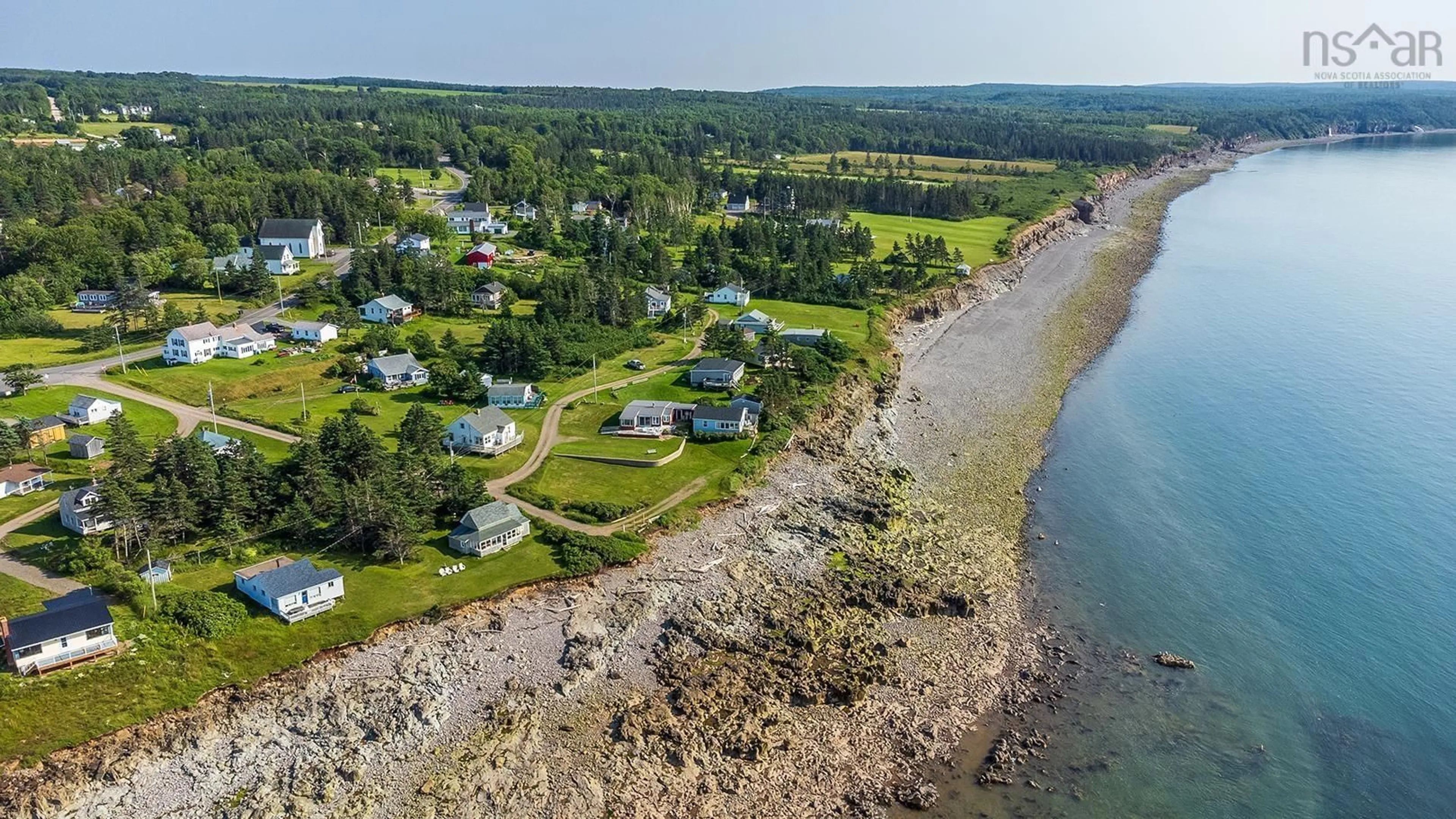 A pic from outside/outdoor area/front of a property/back of a property/a pic from drone, water/lake/river/ocean view for 3 Gordon Rd, Margaretsville Nova Scotia B0S 1N0