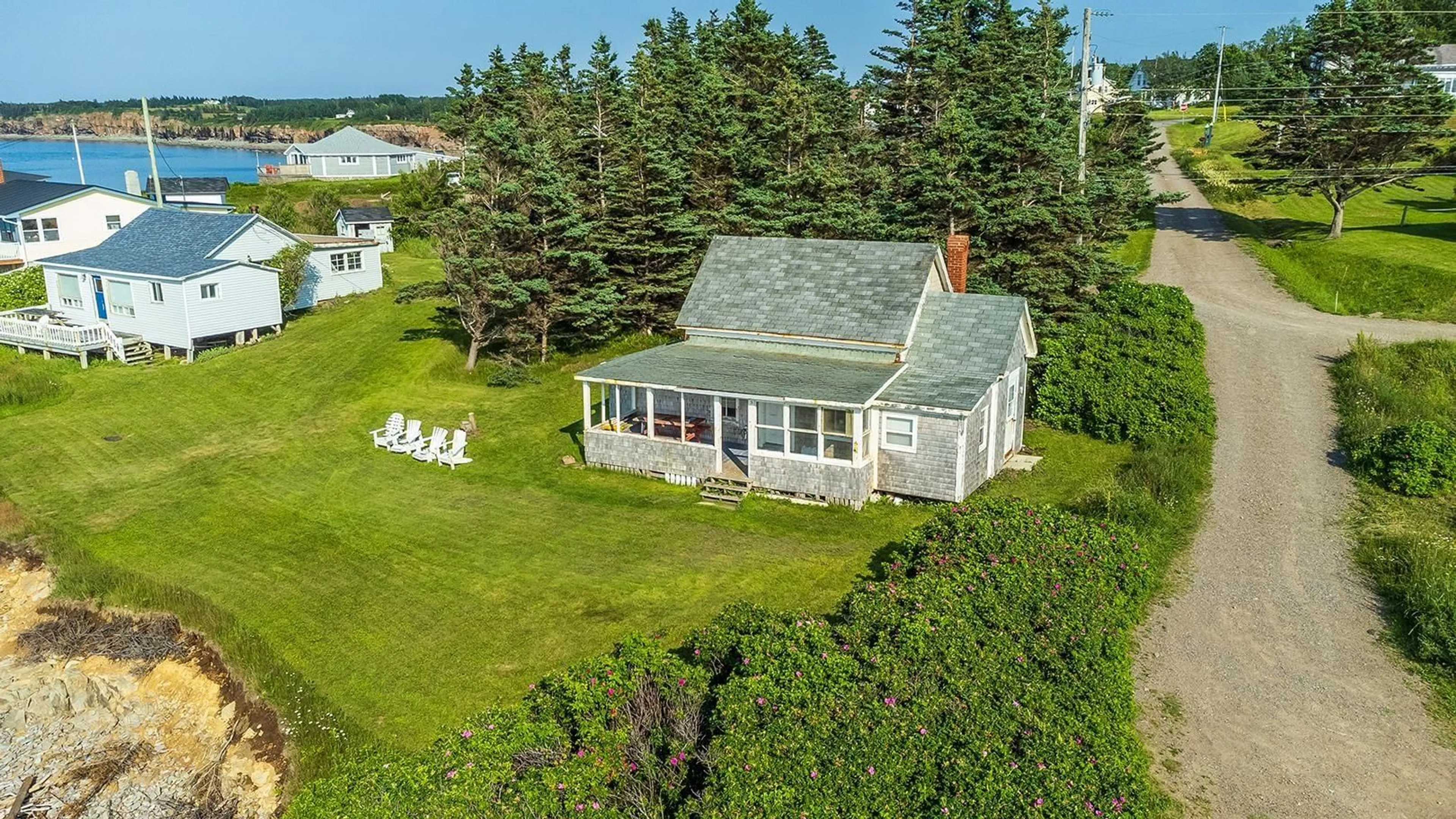 A pic from outside/outdoor area/front of a property/back of a property/a pic from drone, water/lake/river/ocean view for 3 Gordon Rd, Margaretsville Nova Scotia B0S 1N0