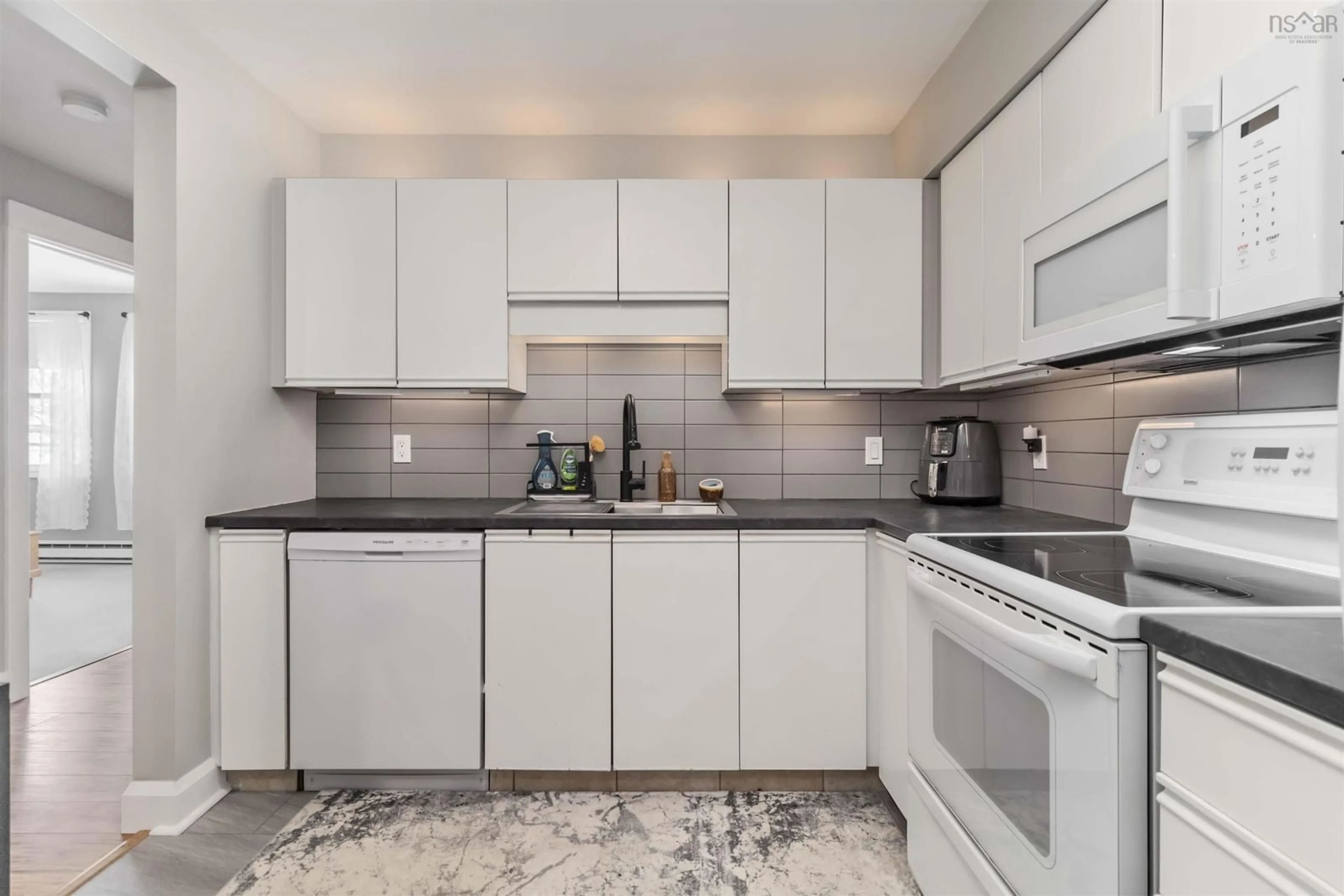 Standard kitchen, ceramic/tile floor for 83 Kearney Lake Rd #302, Halifax Nova Scotia B3M 4E6