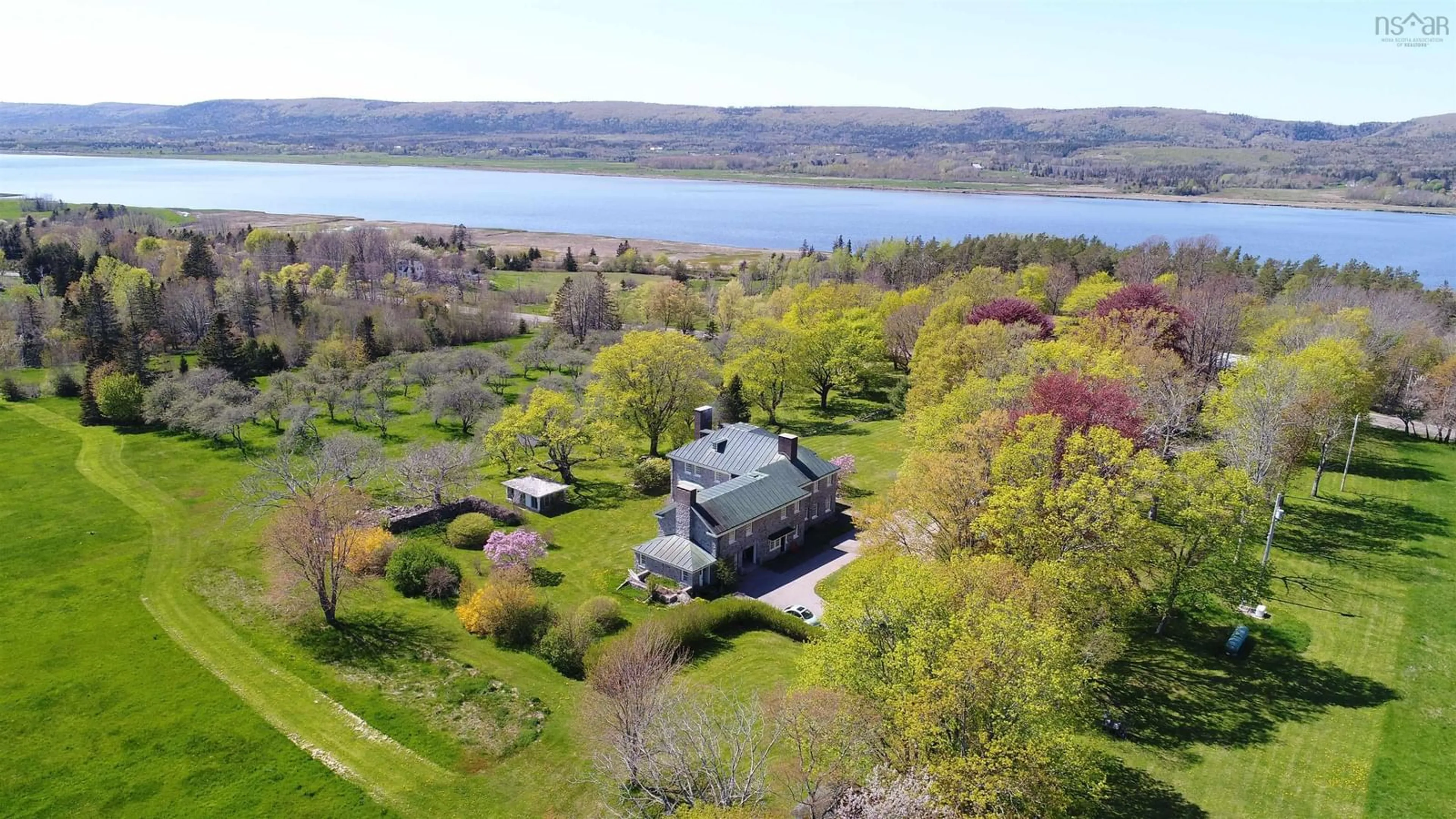 A pic from outside/outdoor area/front of a property/back of a property/a pic from drone, water/lake/river/ocean view for 3746 Highway 1, Allains Creek Nova Scotia B0S 1A0