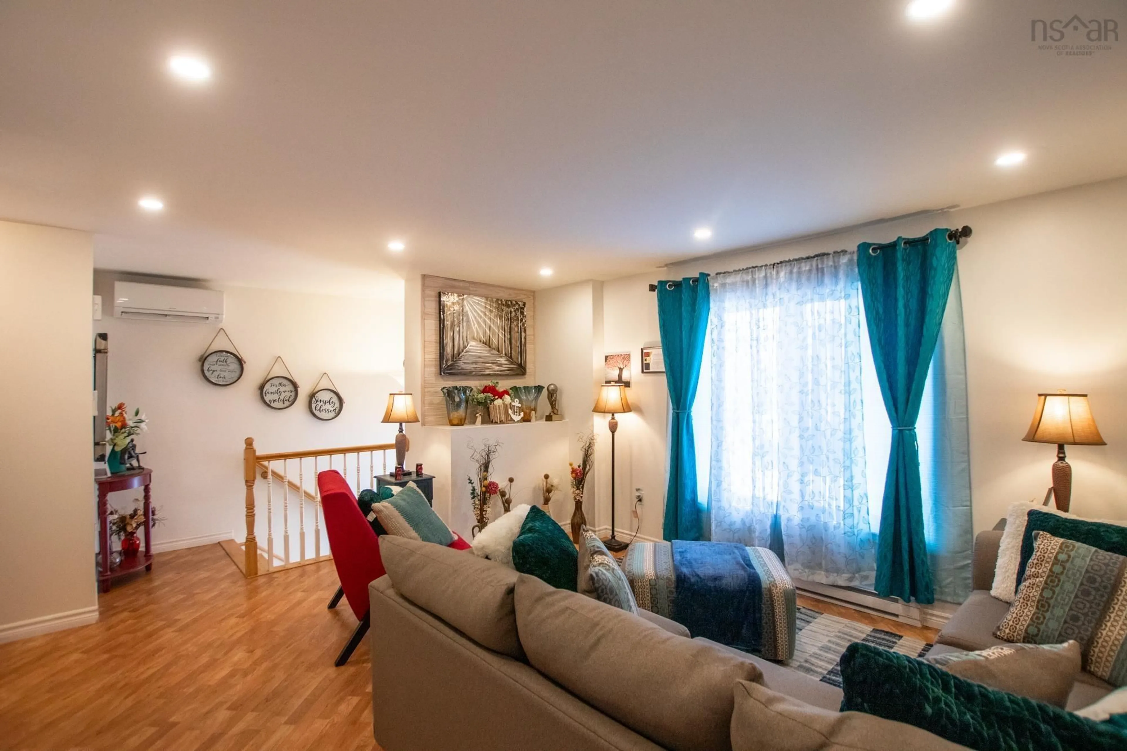 Living room with furniture, wood/laminate floor for 65 Rosewood Lane, Eastern Passage Nova Scotia B3G 1B3