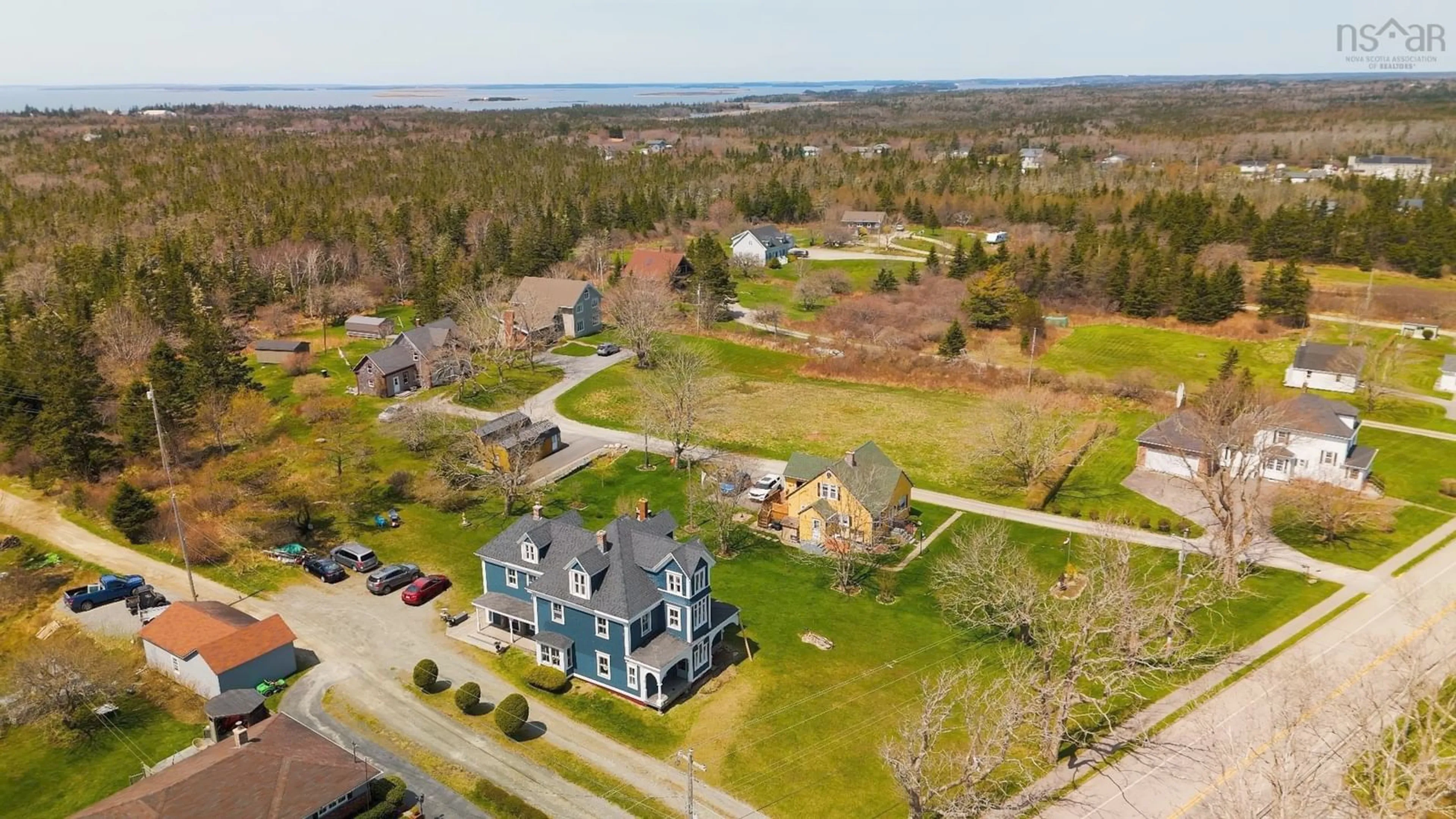 A pic from outside/outdoor area/front of a property/back of a property/a pic from drone, water/lake/river/ocean view for 1124 Highway 335, Middle West Pubnico Nova Scotia B0W 3S0
