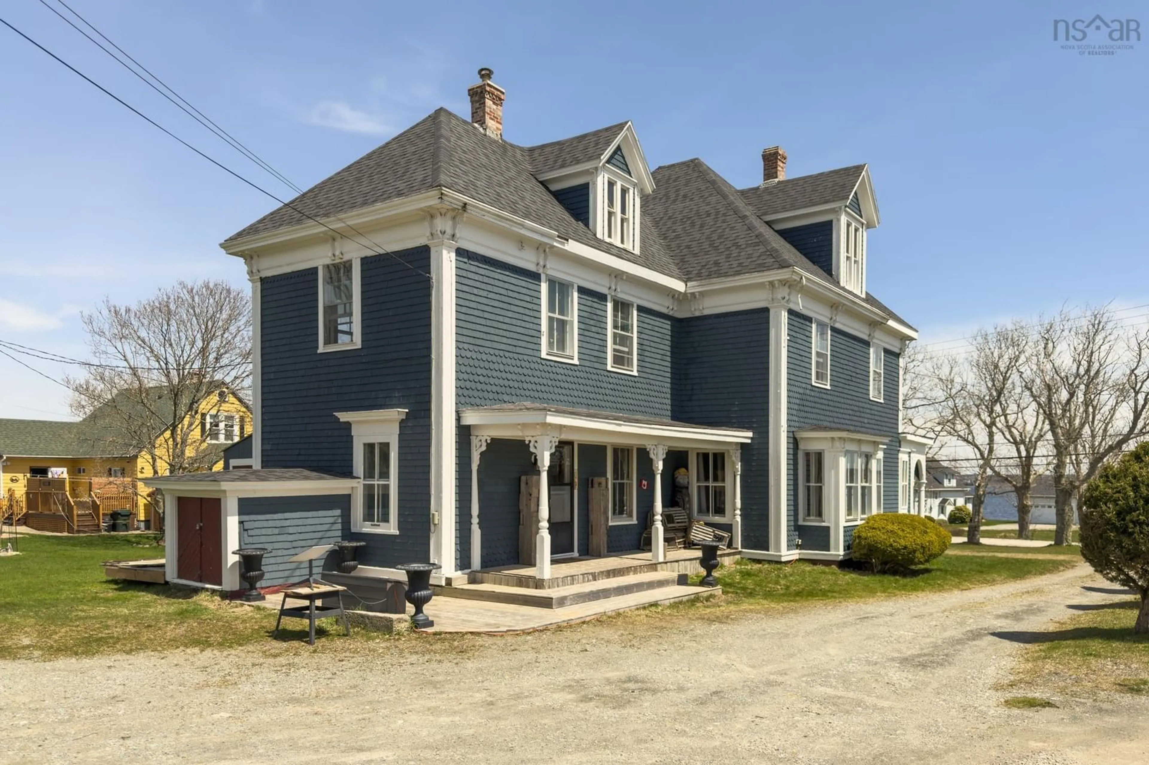A pic from outside/outdoor area/front of a property/back of a property/a pic from drone, street for 1124 Highway 335, Middle West Pubnico Nova Scotia B0W 3S0